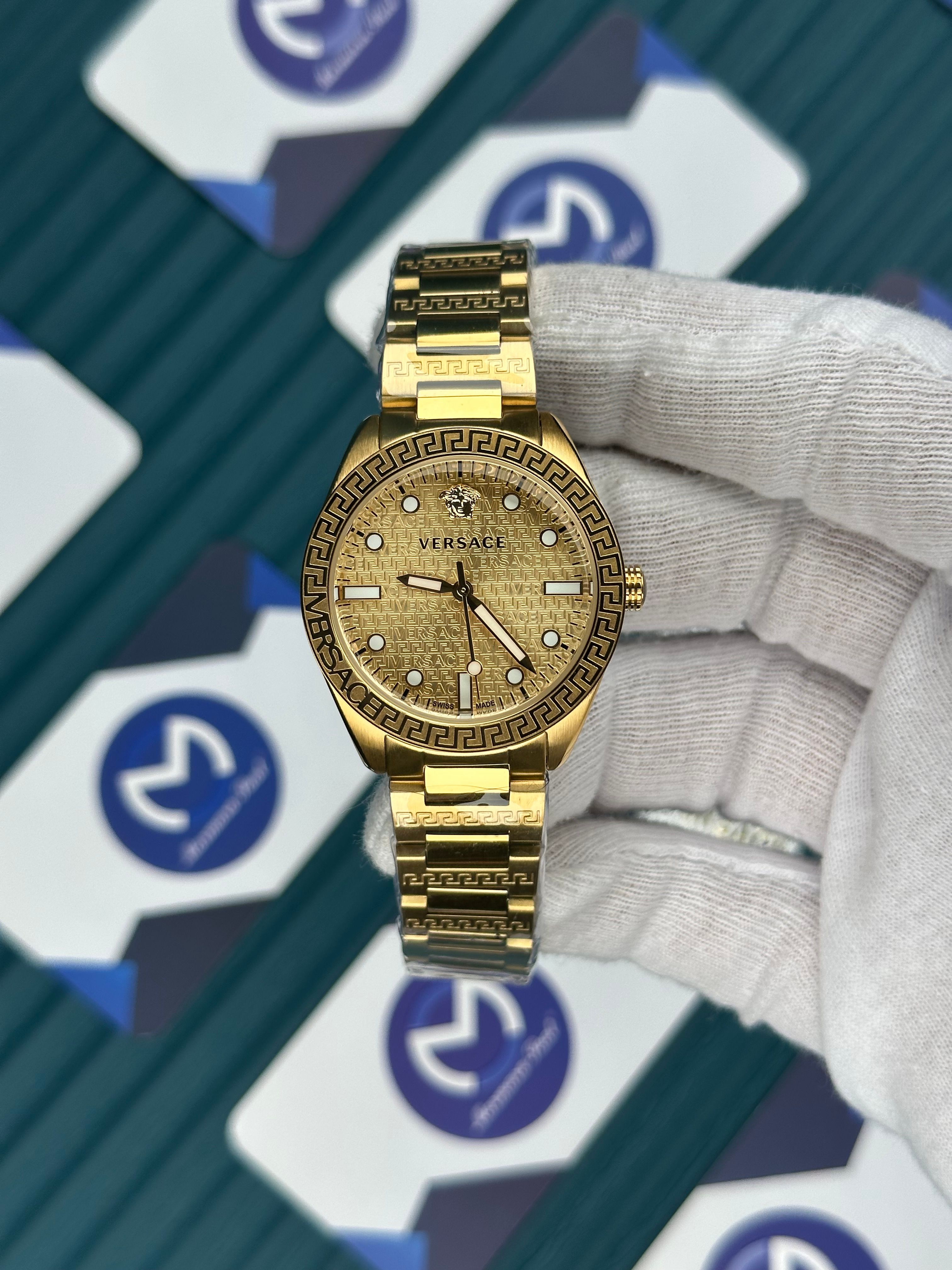 VERSACE 36 GOLD KADRAN DESENLİ BEZEL GOLD KORDON