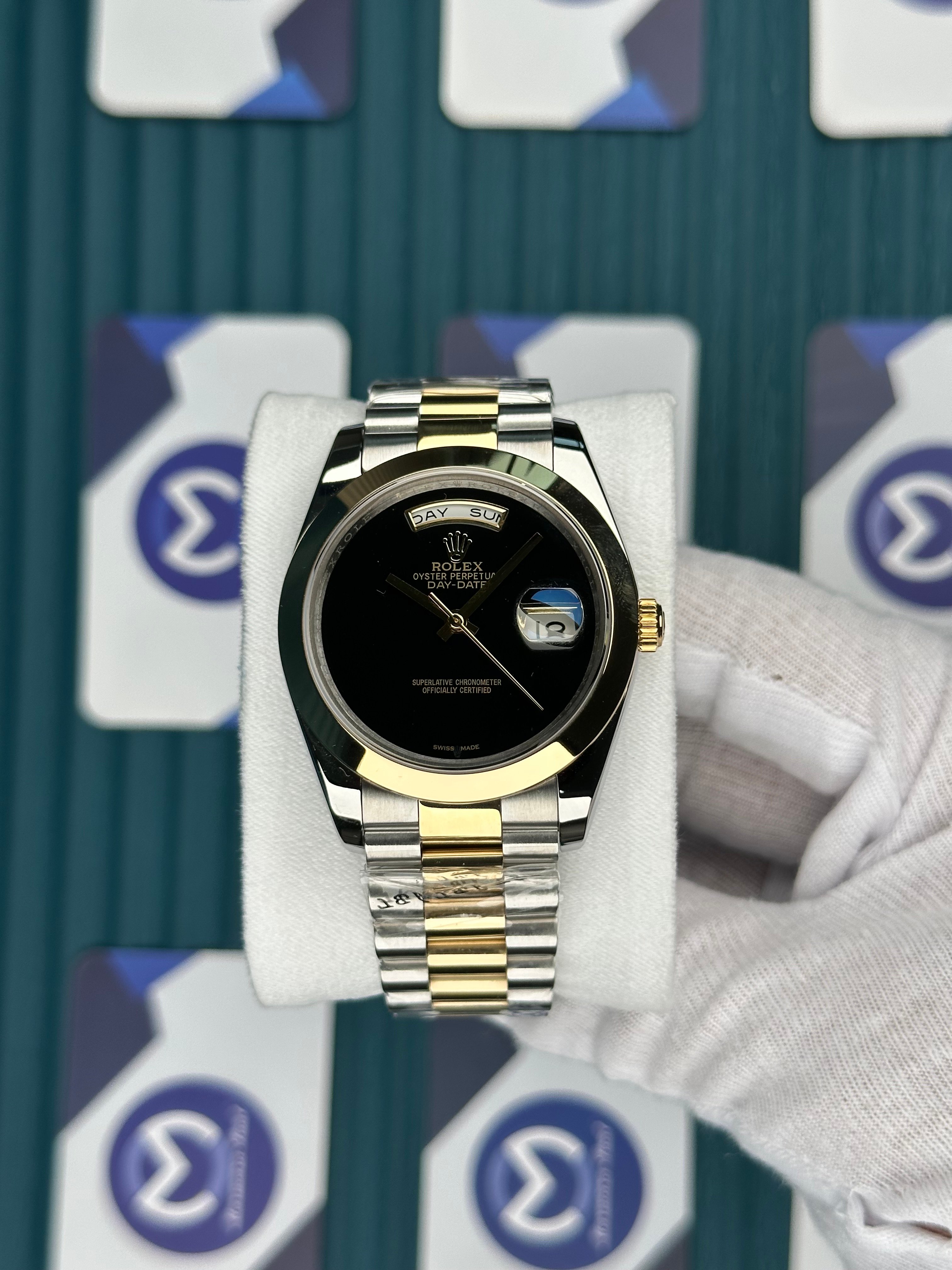 ROLEX DAY-DATE BLACK DIAL OVAL BEZEL GOLD-SILVER PRESIDENT