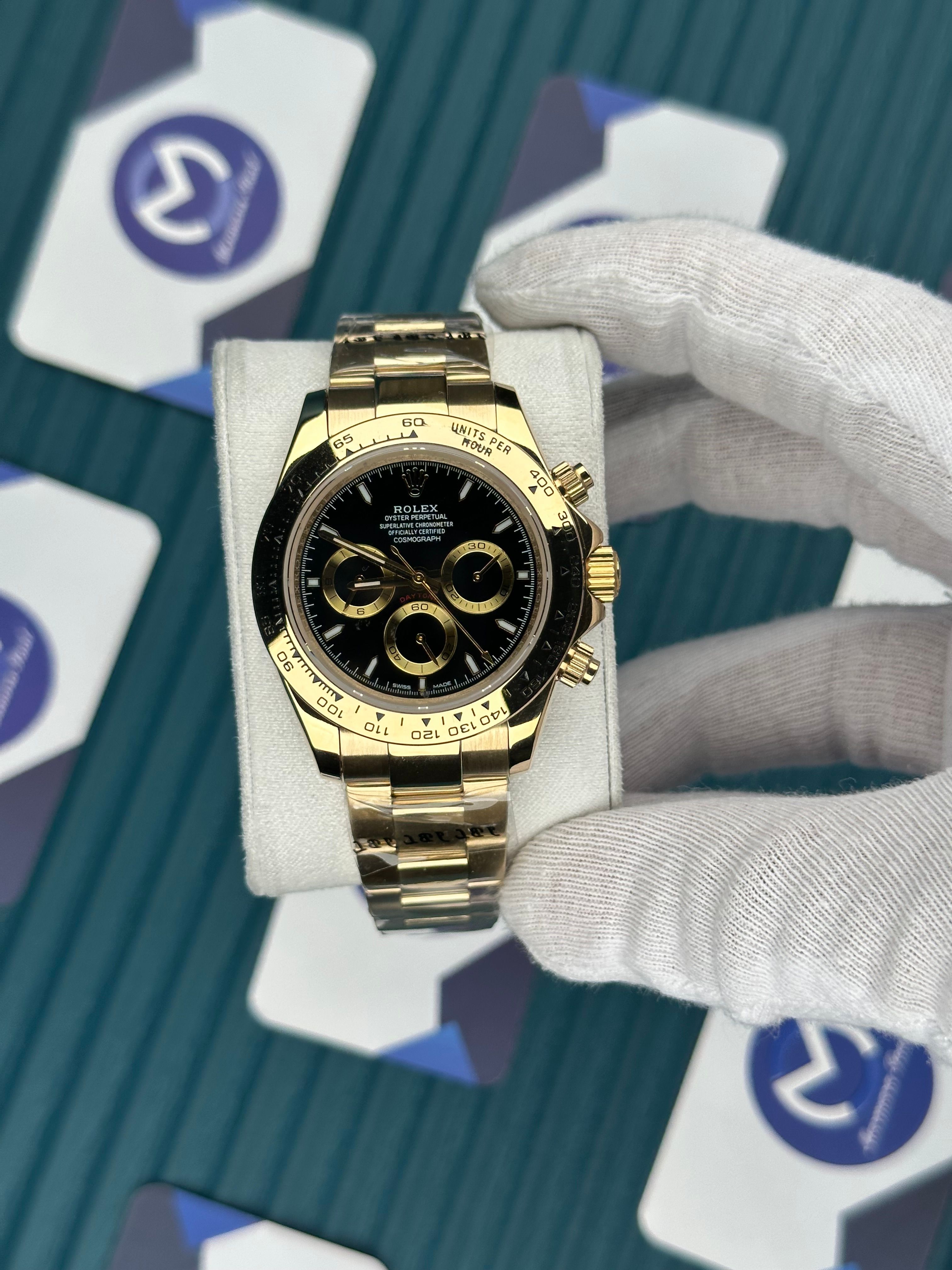 ROLEX DAYTONA BLACK DIAL OYSTER GOLD
