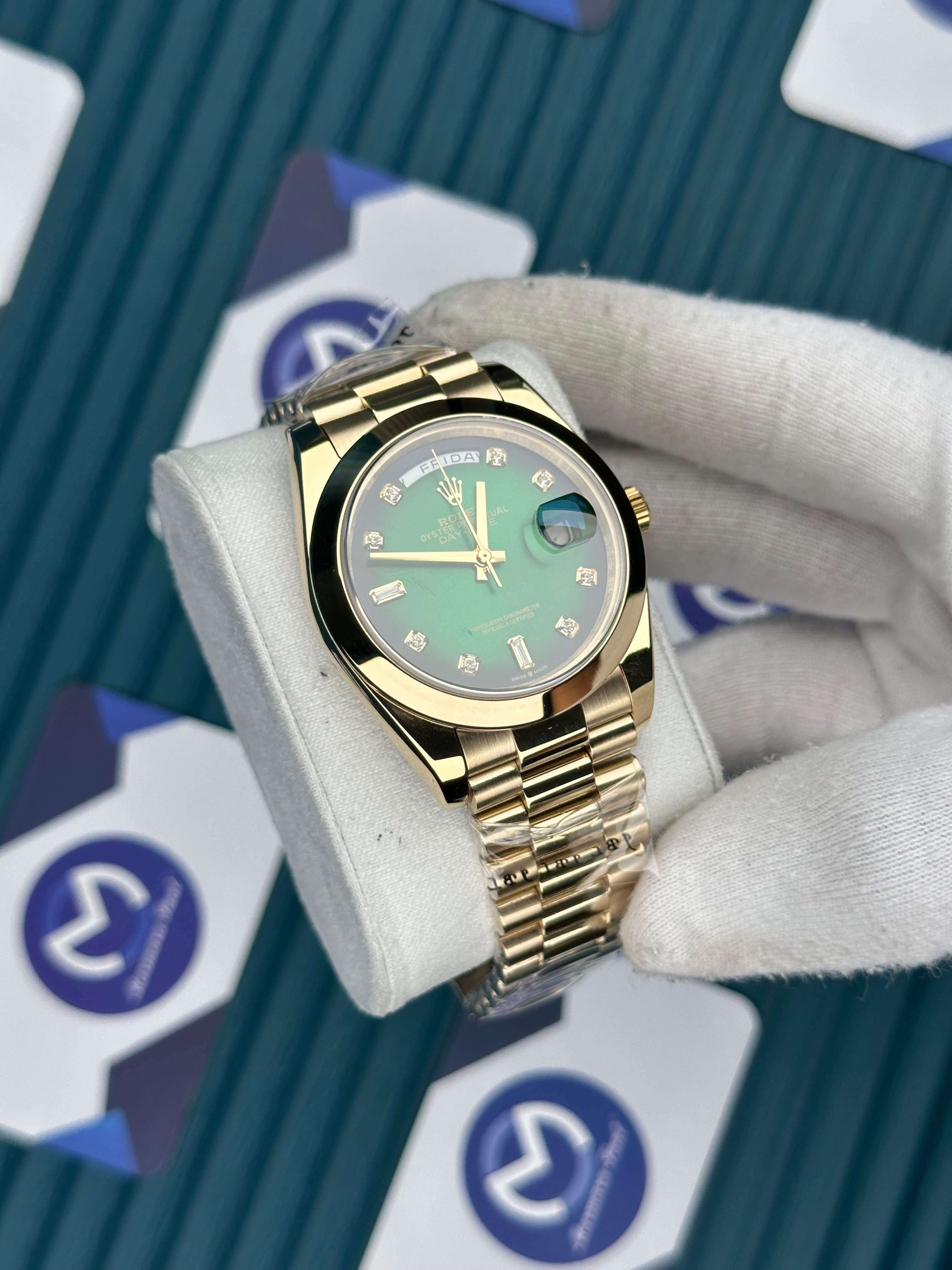 ROLEX DAY-DATE GREEN DIAL OVAL BEZEL DIAMOND INDEX GOLD PRESIDENT