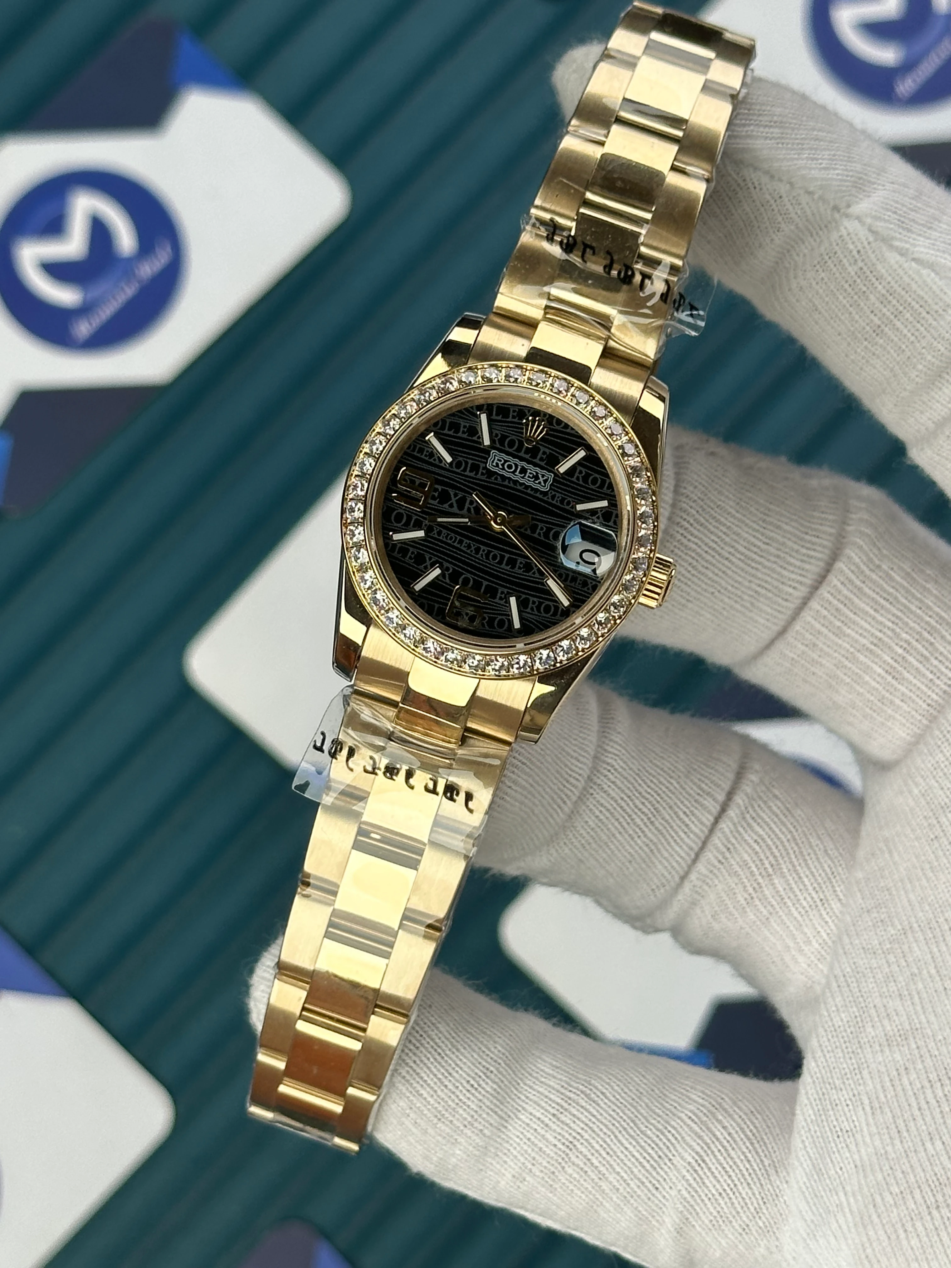 ROLEX 31 MM DATEJUST BLACK PATTERNED DIAL ROD INDEX DIAMOND BEZEL GOLD OYSTER 