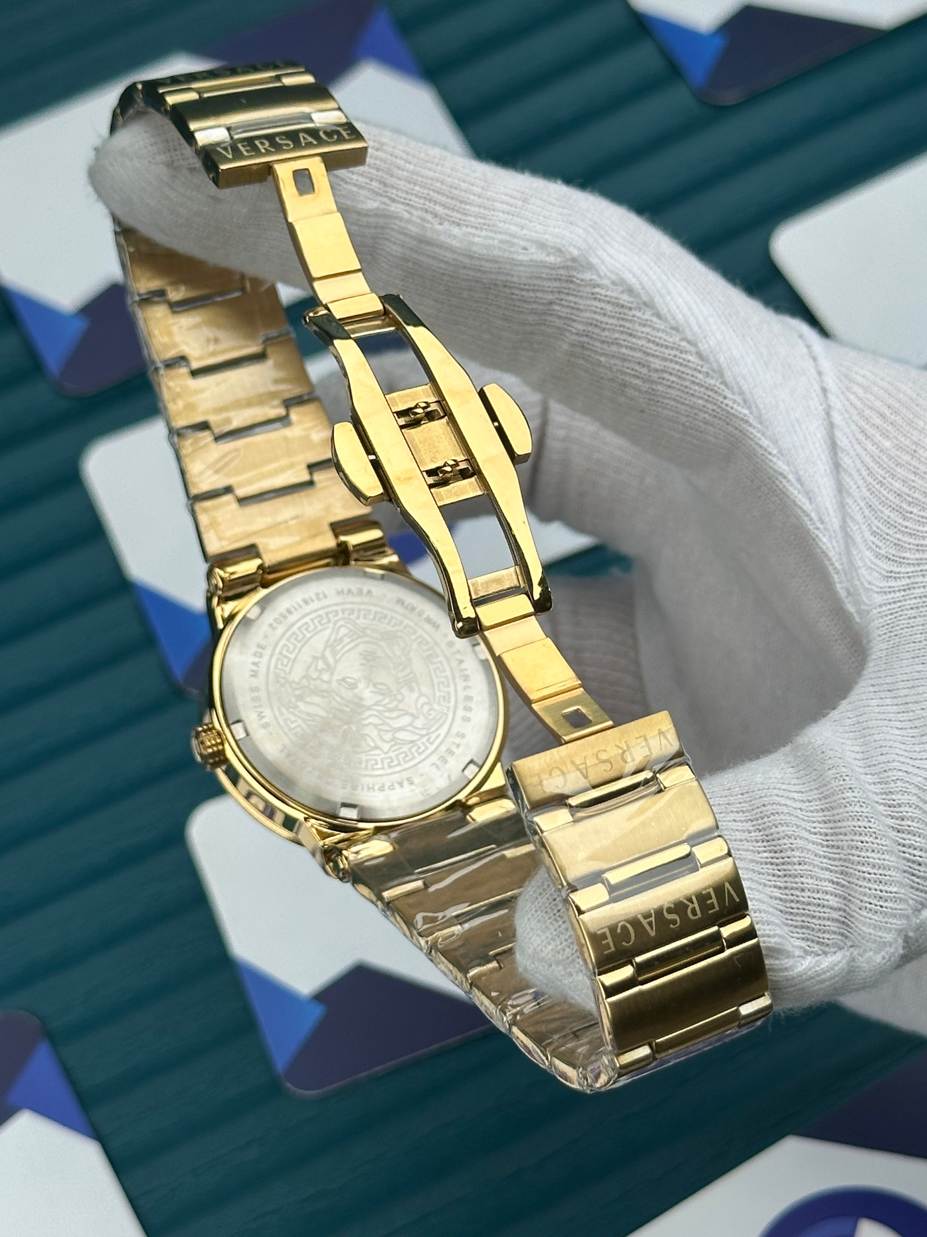 VERSACE 36 GREEN DIAL GOLD CORD