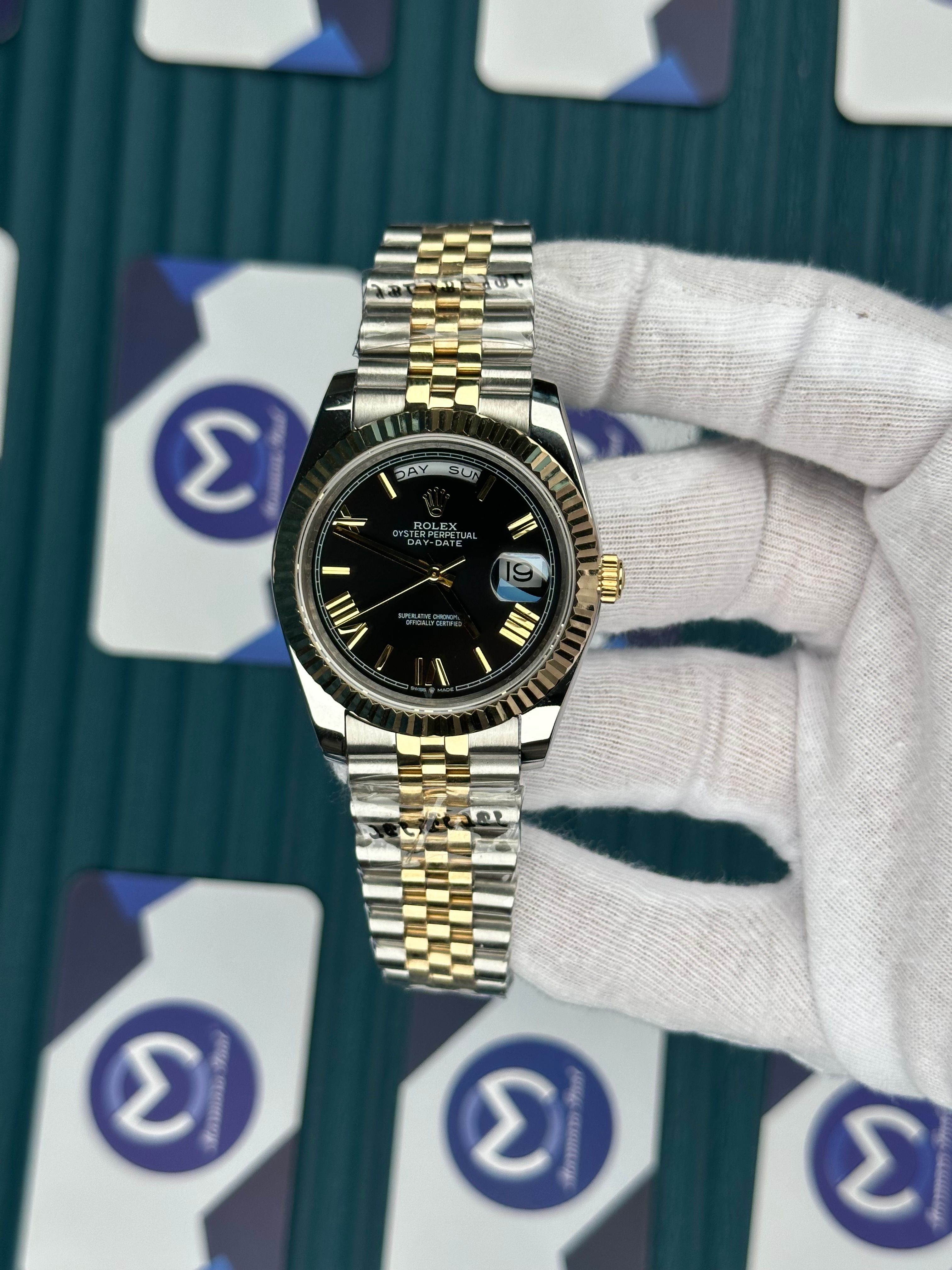 ROLEX DAY-DATE BLACK DIAL ROMA INDEX GOLD-SILVER JUBILE