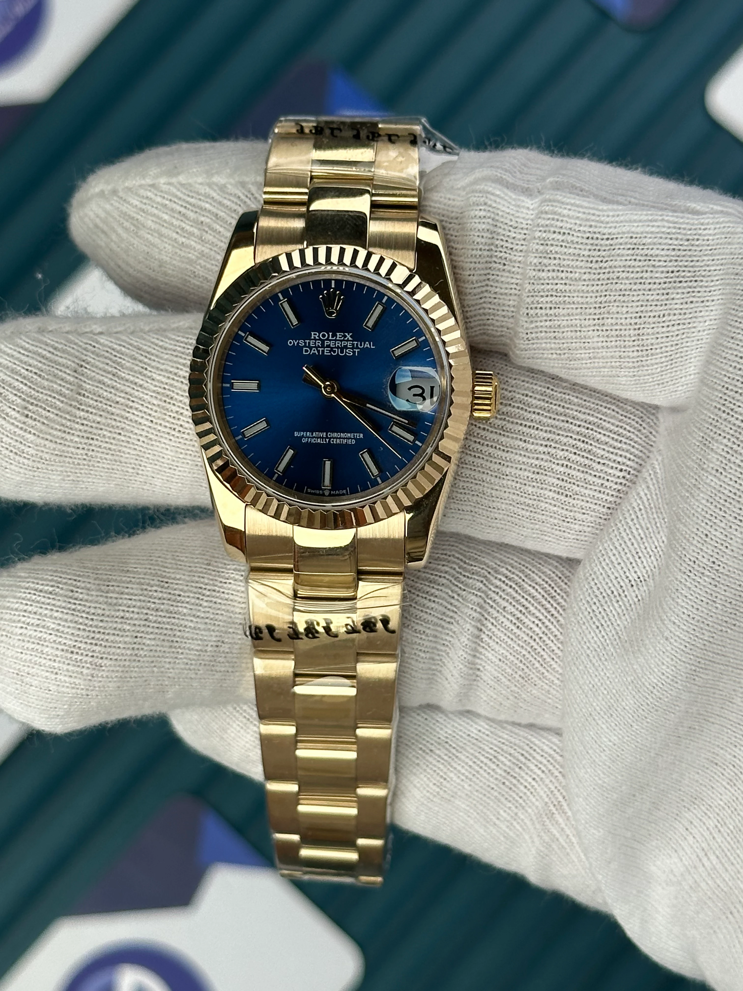 ROLEX 31 MM DATEJUST BLUE DIAL ROD INDEX GOLD OYSTER 