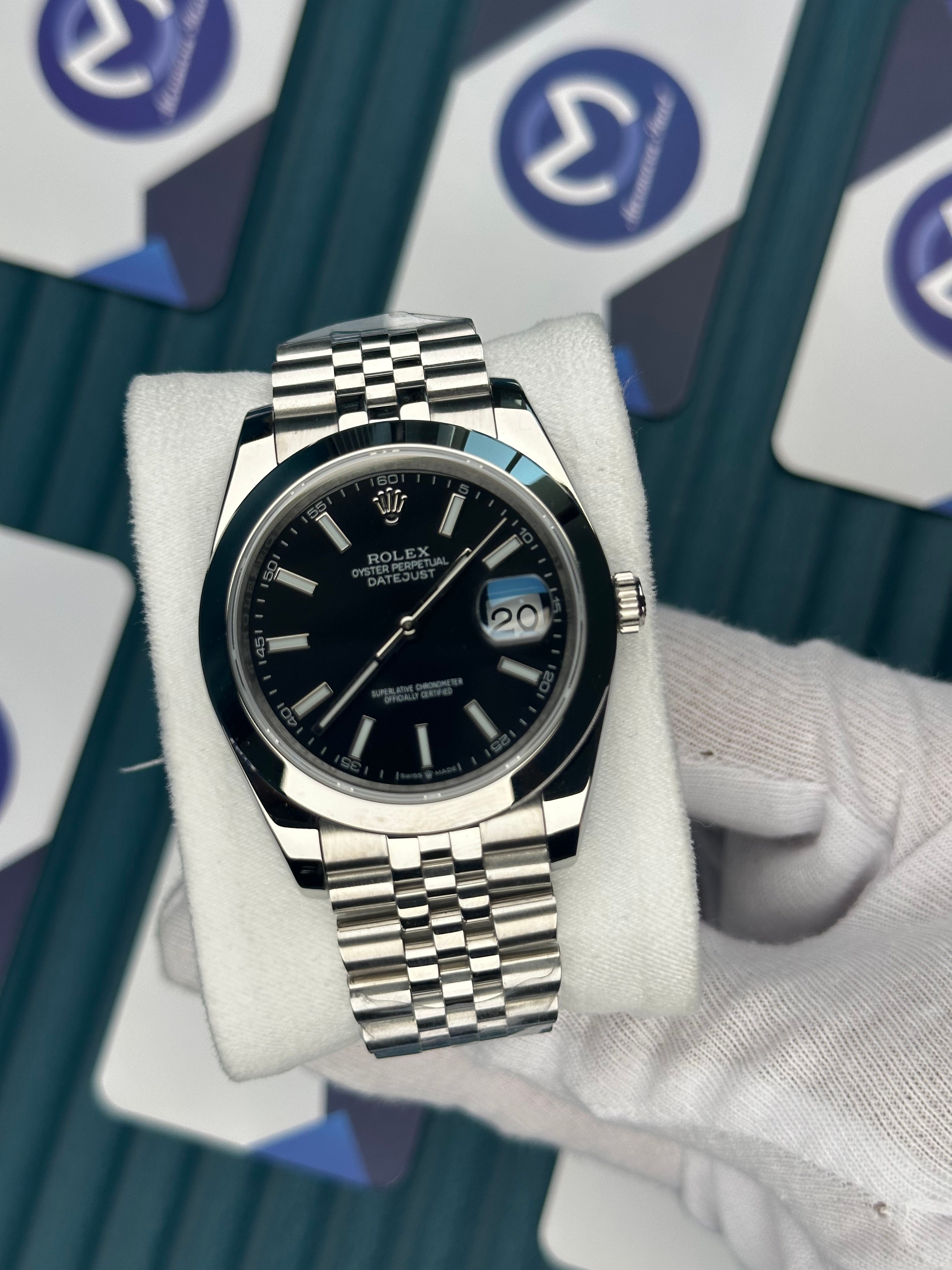 ROLEX DATEJUST BLACK DIAL OVAL BEZEL SILVER JUBILE