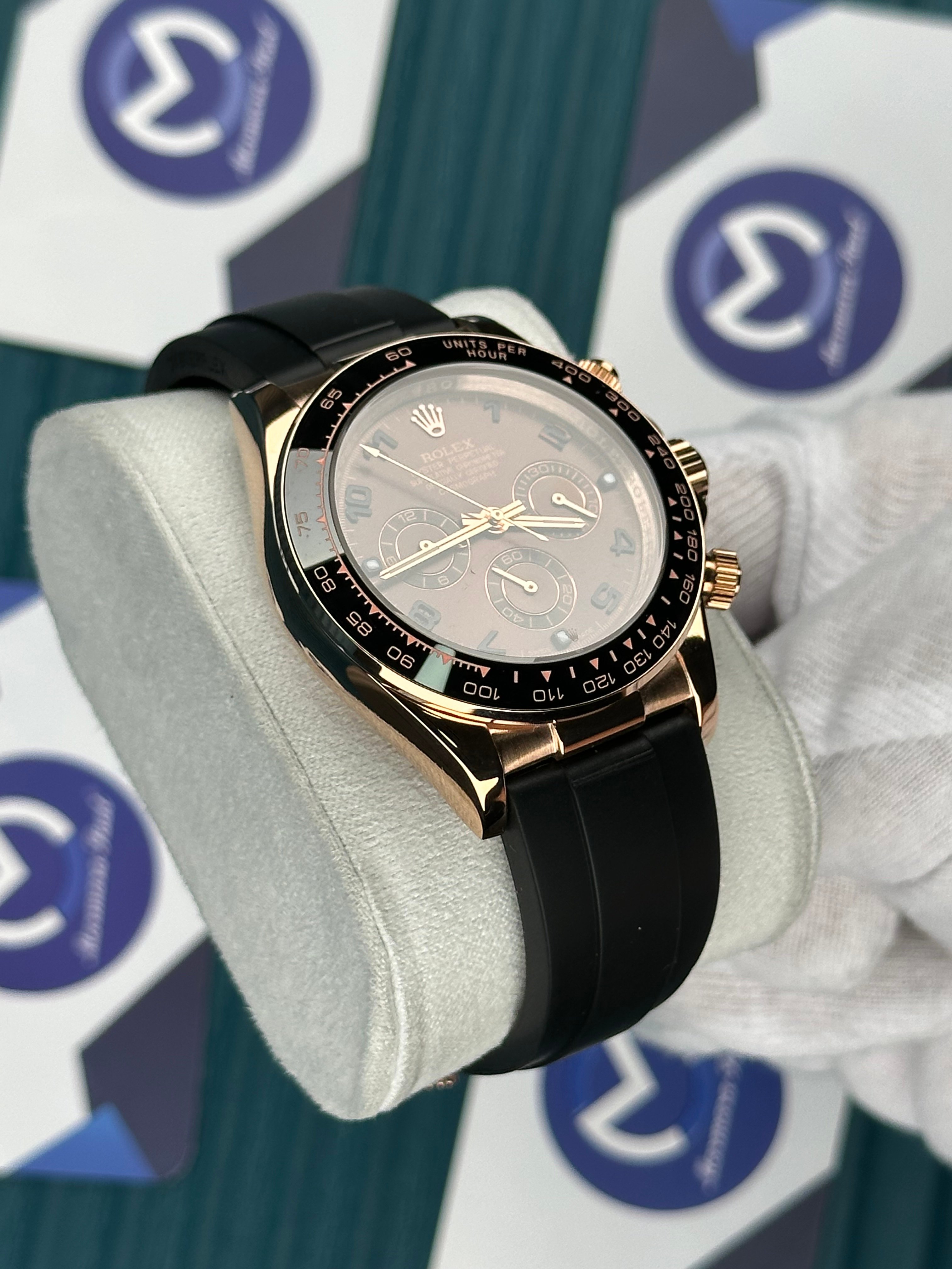 ROLEX DAYTONA CHOCOLATE DIAL ROSE CASE OYSTERFLEX