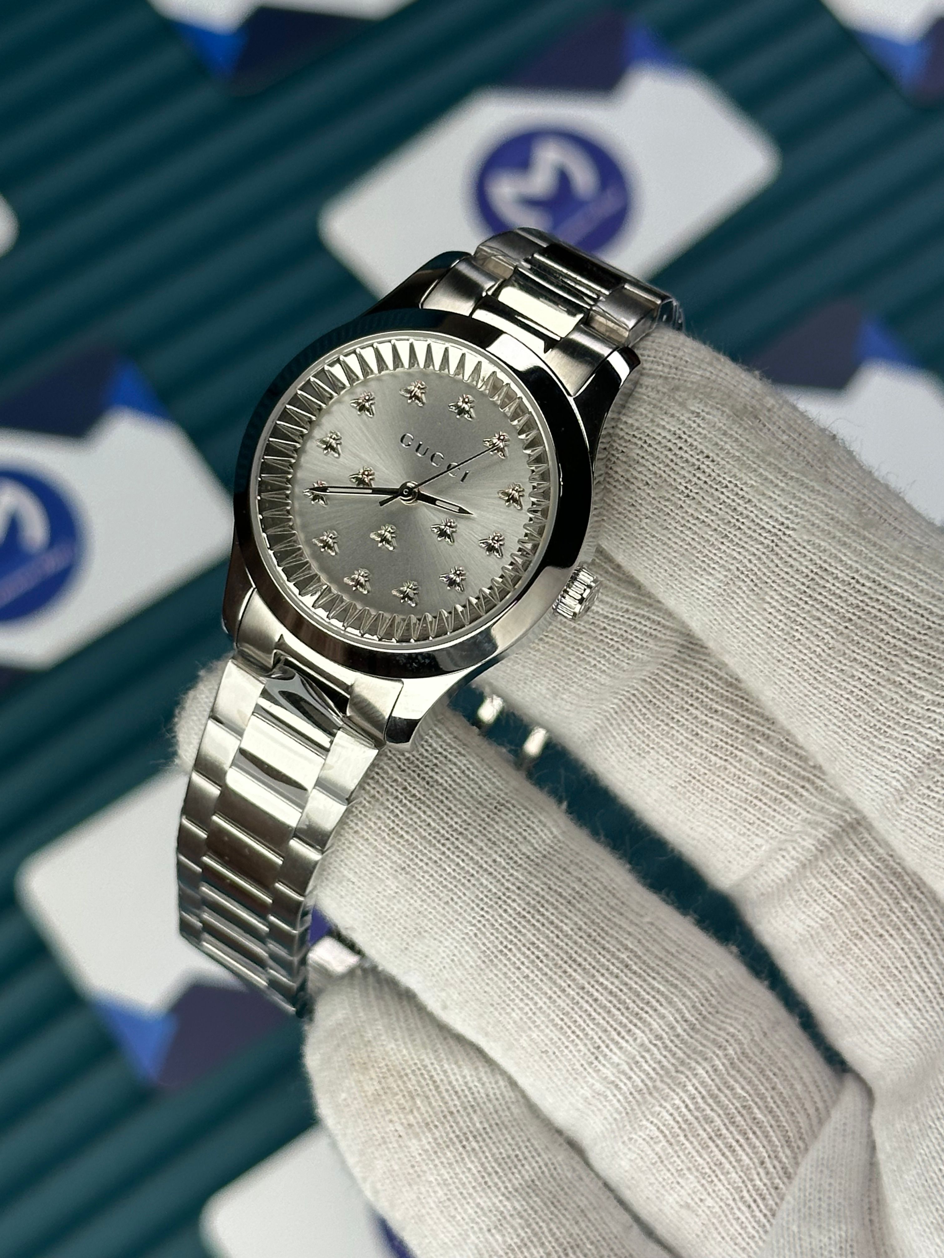 GUCCI WOMAN WHITE DIAL BUTTERFLY MOTIF SILVER