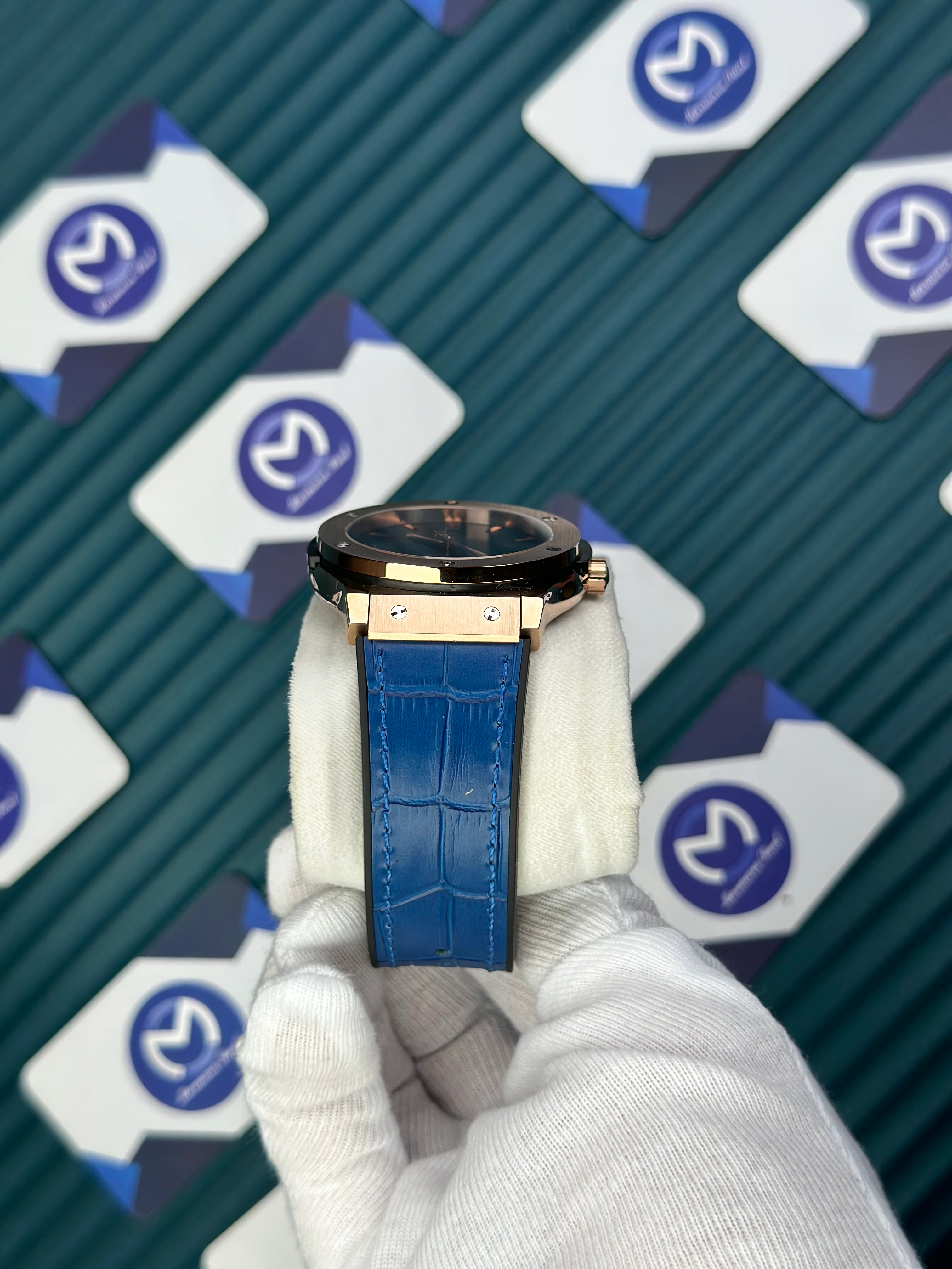 HUBLOT GENEVE AUTOMATIC VENDOME BLUE DIAL AND LEATHER CORD ROSE CASE