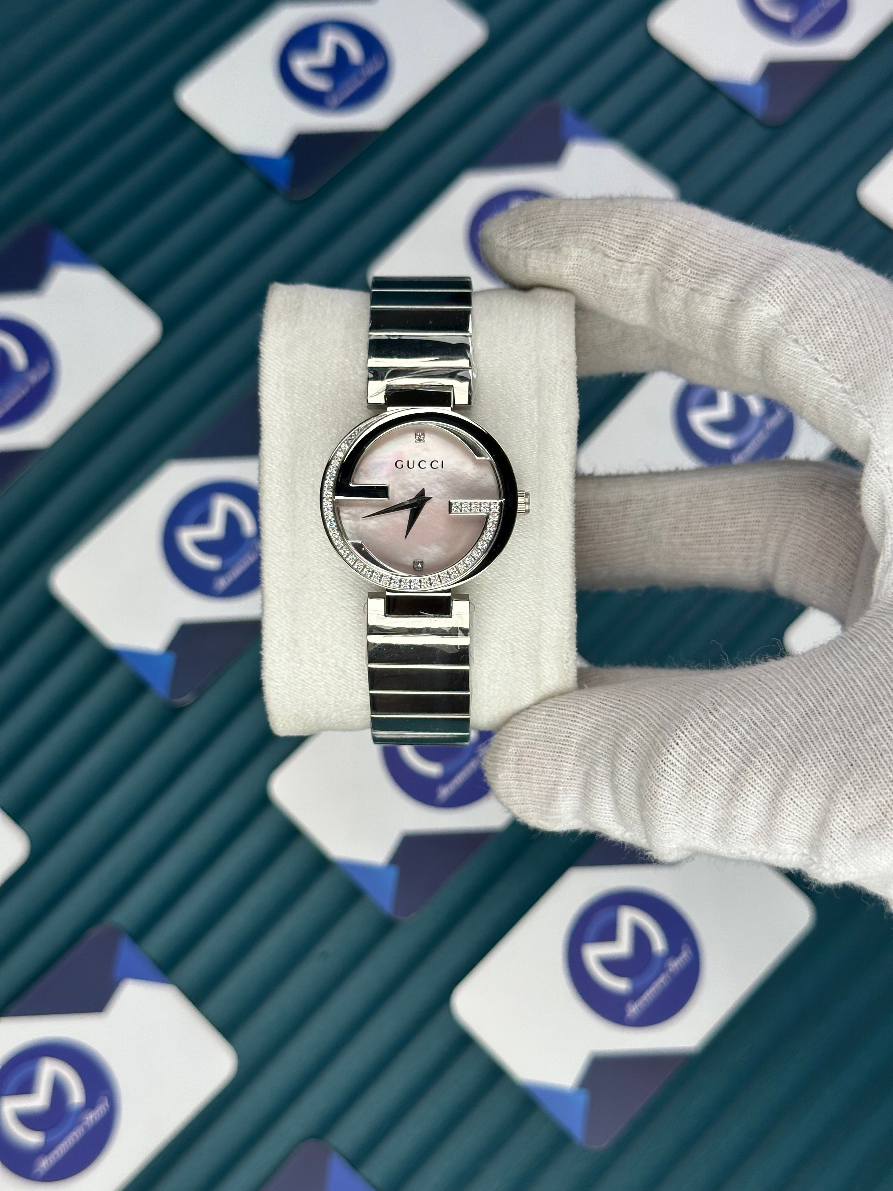 GUCCI WOMAN PINK DIAL G CASAE DIAMOND DIAL SILVER CORD