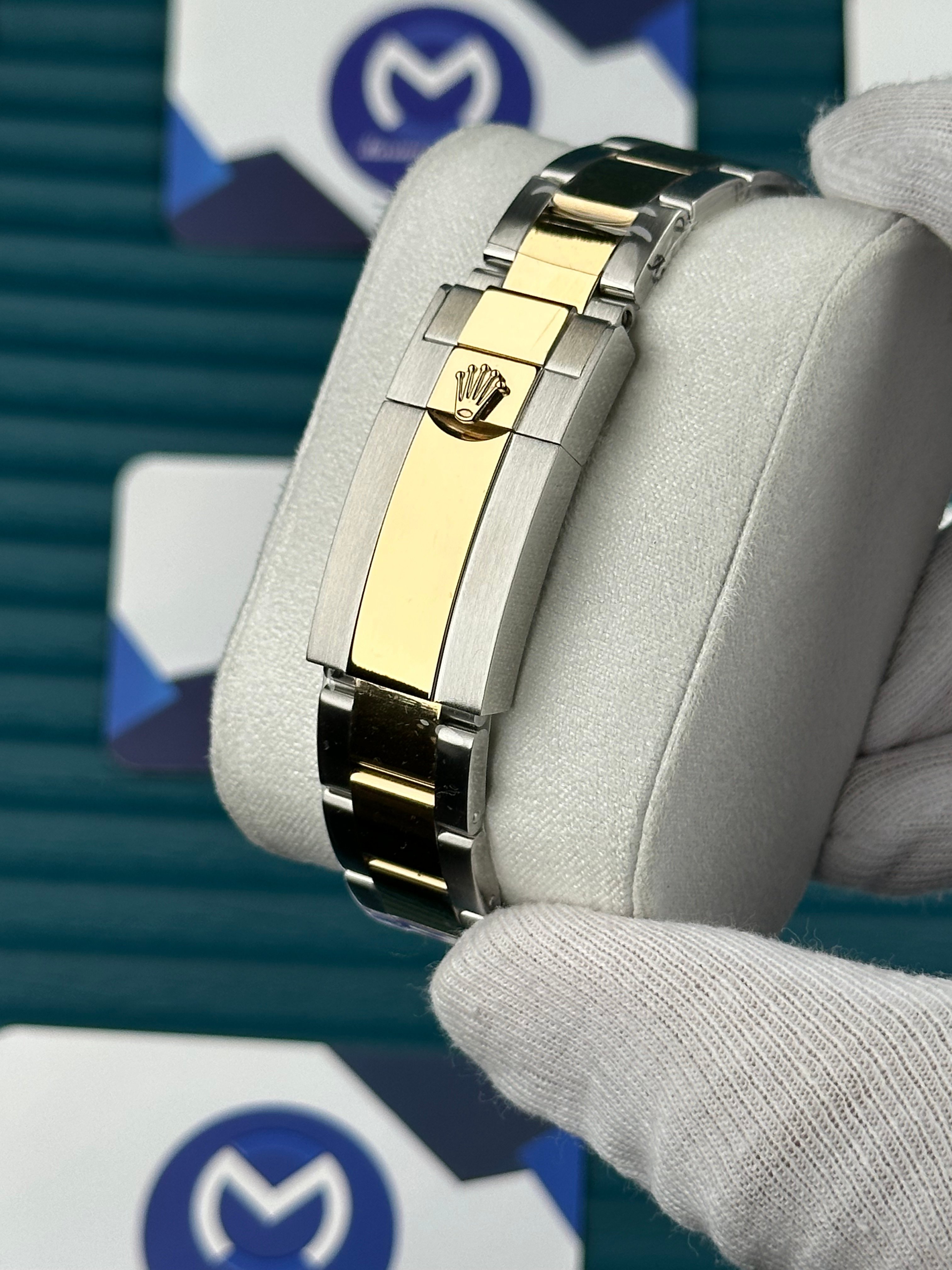 ROLEX SUBMARINER BLACK DIAL GOLD-SILVER OYSTER