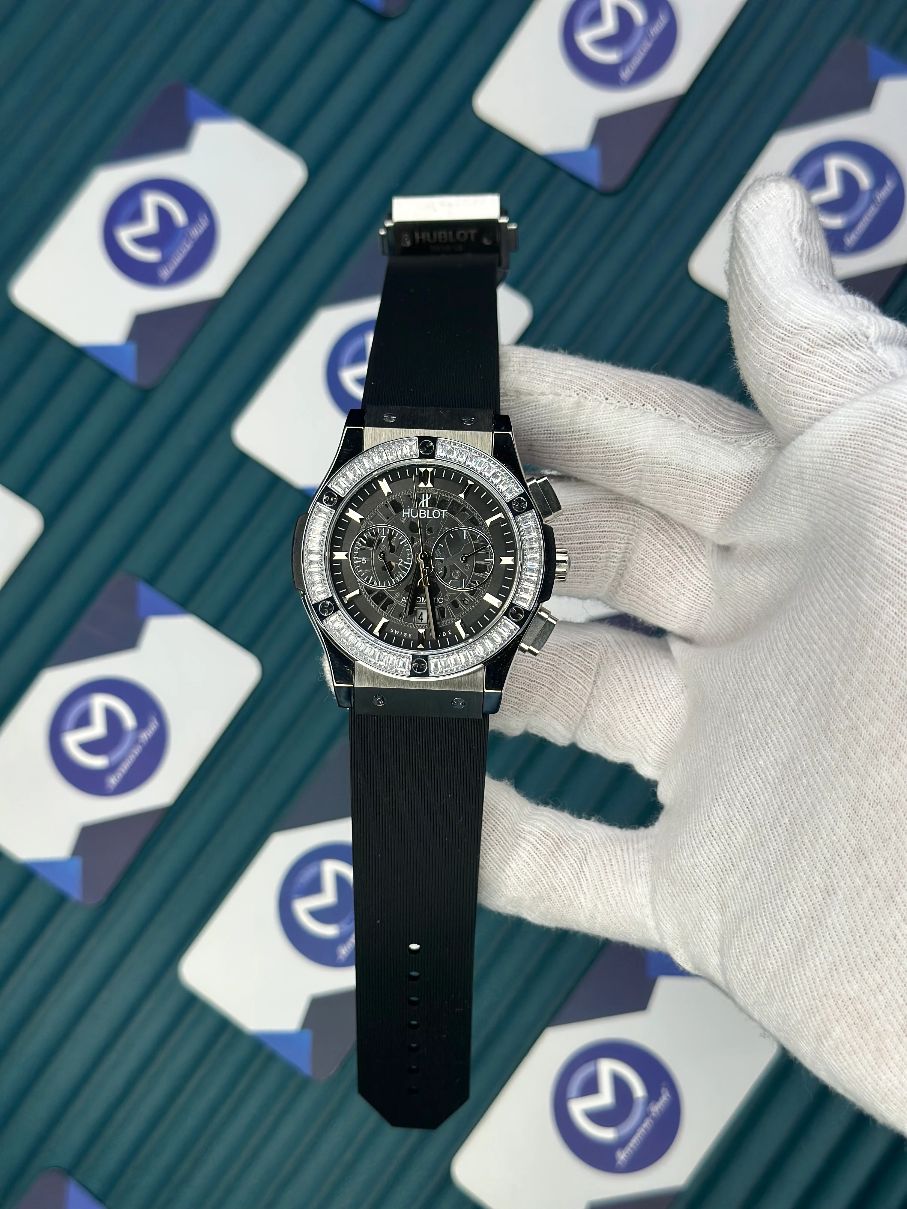 HUBLOT AUTOMATIC SKELETON DIAL DIAMOND BEZEL SILVER CASE BLACK RUBBER CORD 