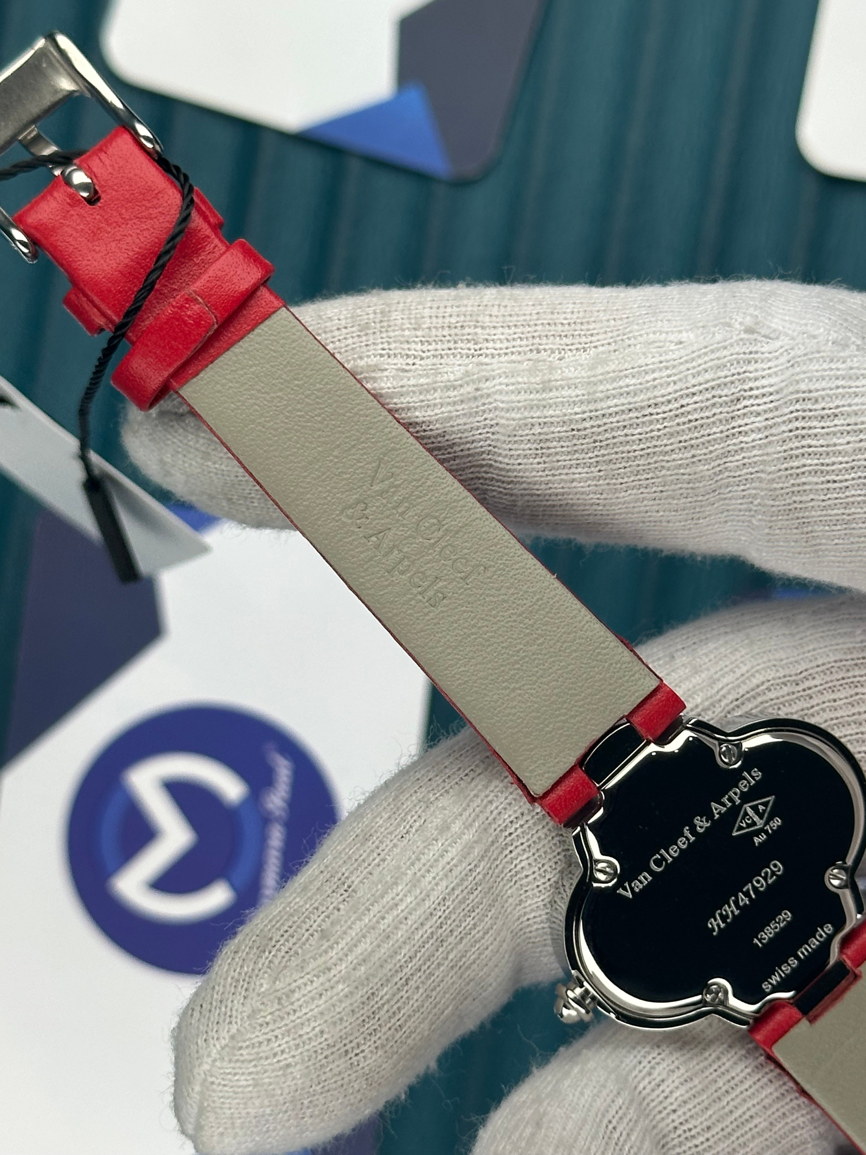 VAN CLEEF & ARPELS RED DIAL DIAMOND BEZEL SILVER CASE RED LEATHER CORD