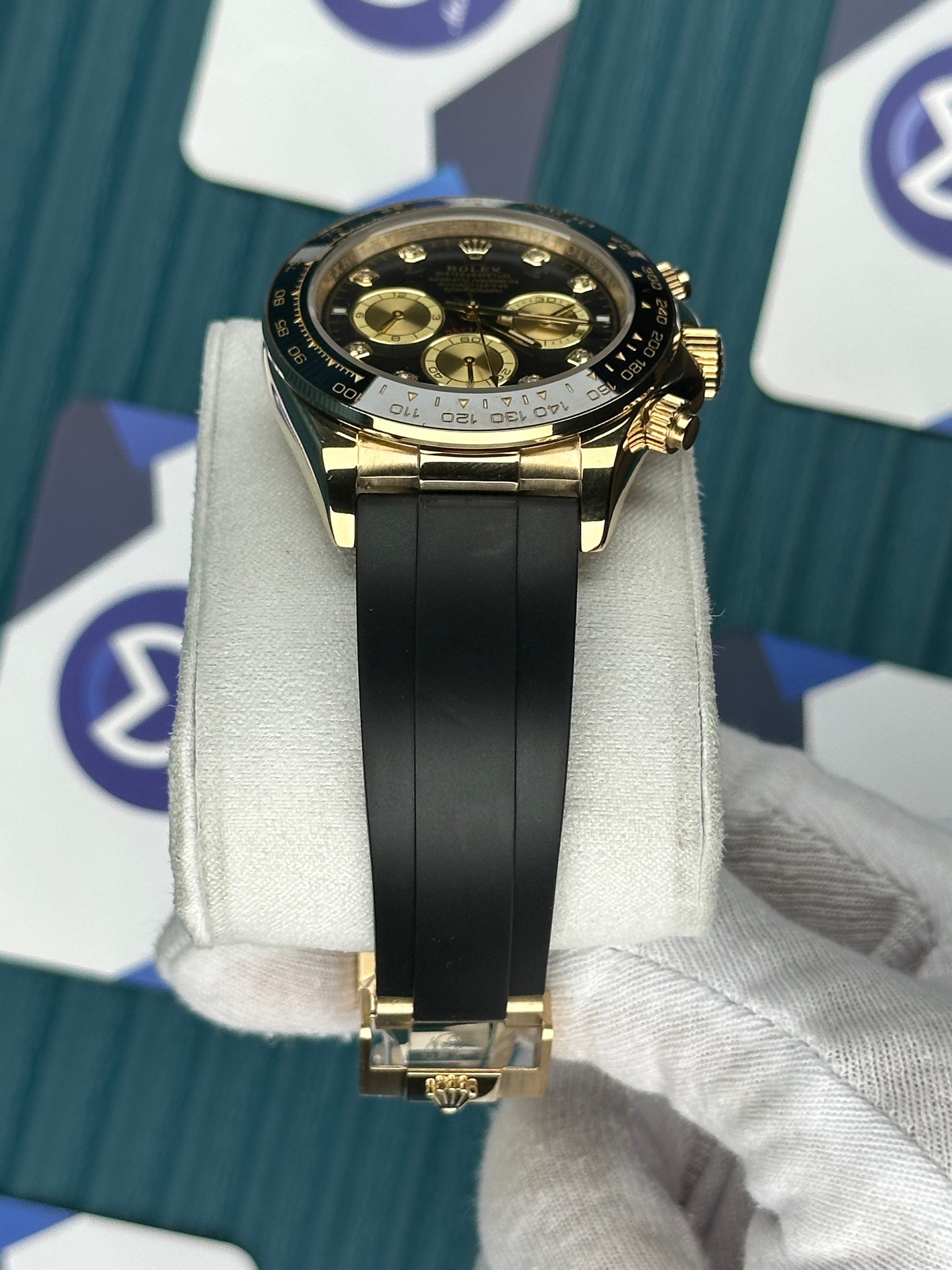 ROLEX DAYTONA BLACK DIAL DIAMOND INDEX GOLD CASE OYSTERFLEX