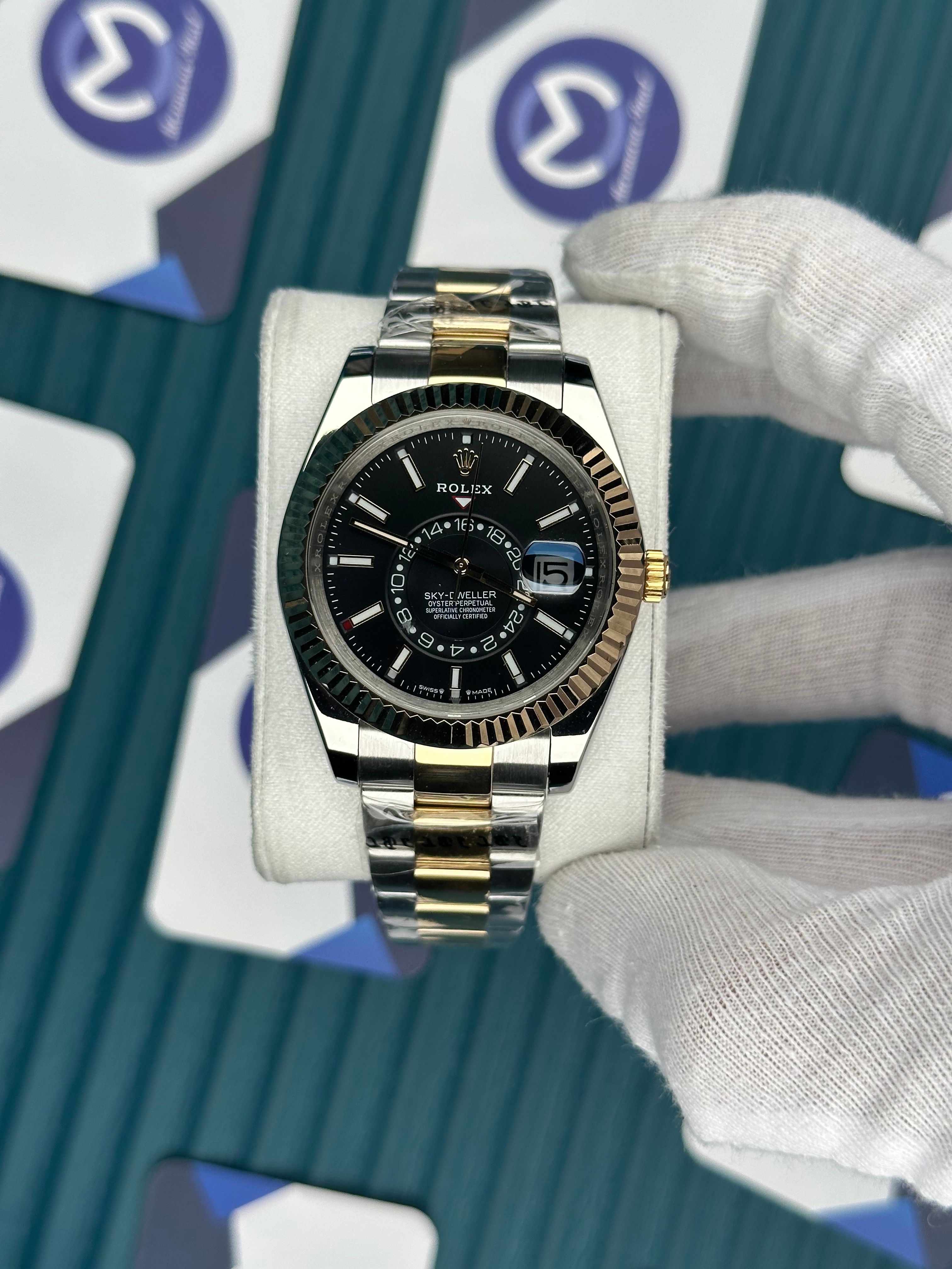 ROLEX SKY-DWELLER BLACK DIAL GOLD-SILVER OYSTER