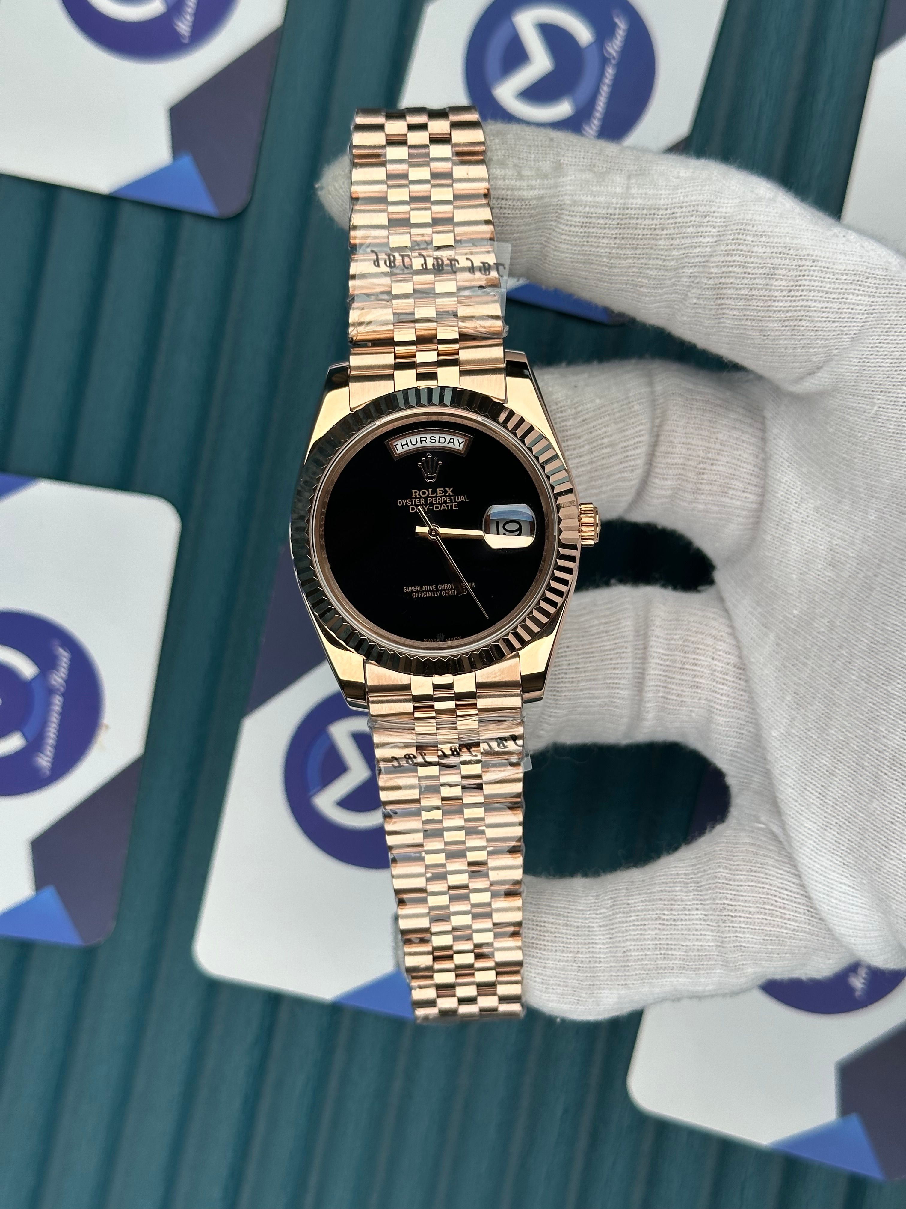 ROLEX DAY-DATE BLACK DIAL ROSE JUBILE