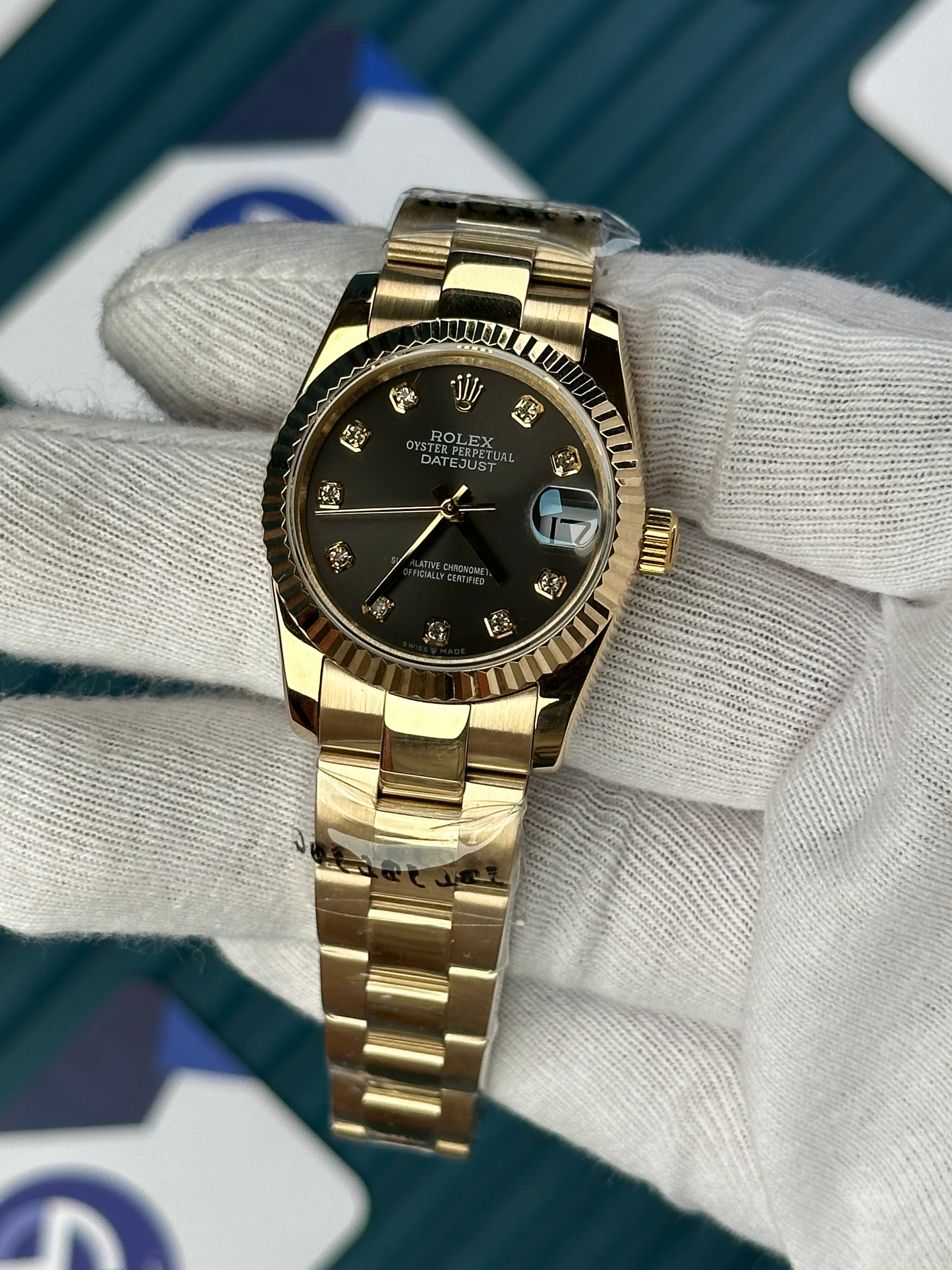 ROLEX 31 MM DATEJUST GREY DIAL DIAMOND INDEX GOLD OYSTER 