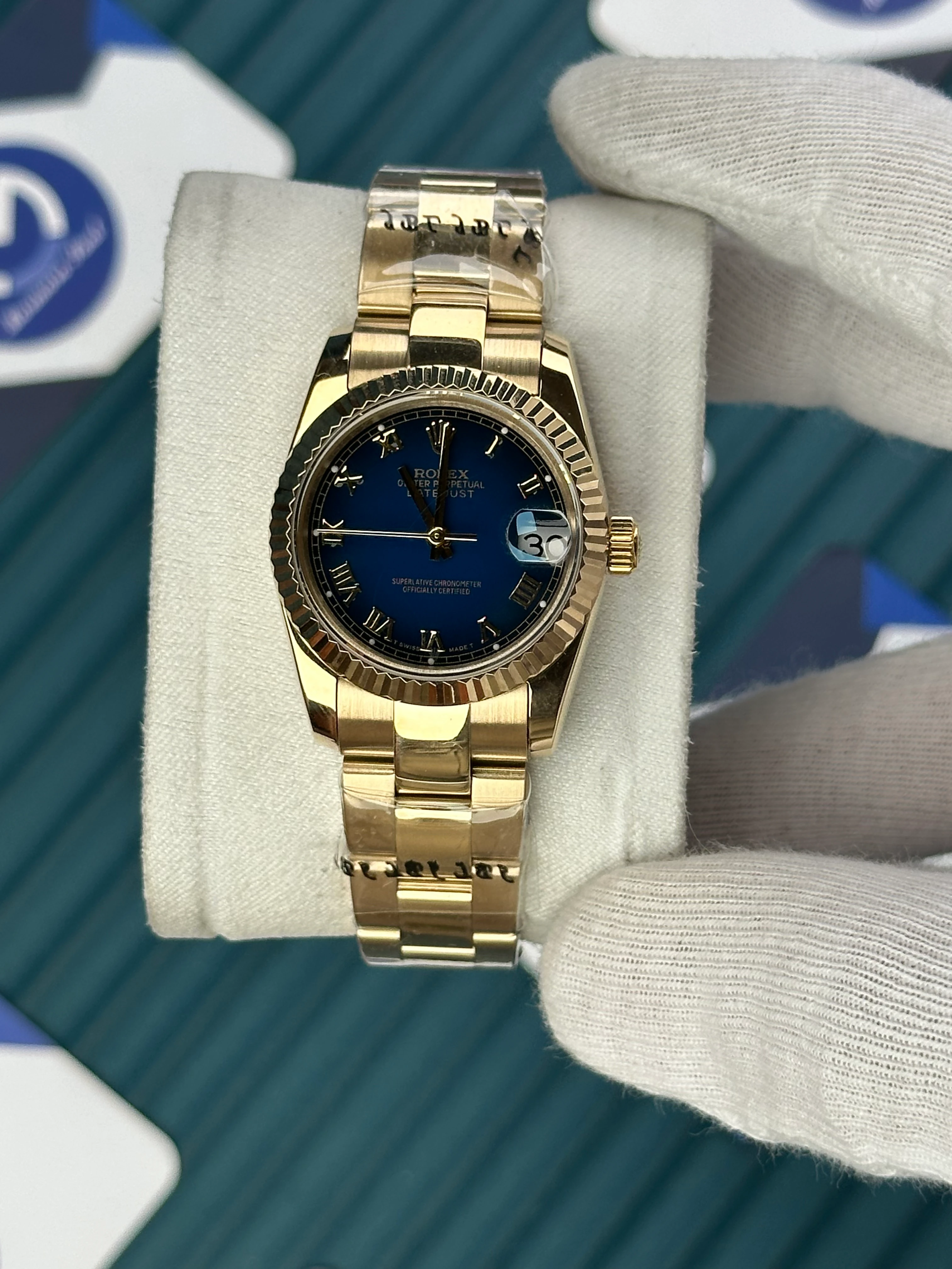 ROLEX 31 MM DATEJUST BLUE DIAL ROMA INDEX GOLD OYSTER 