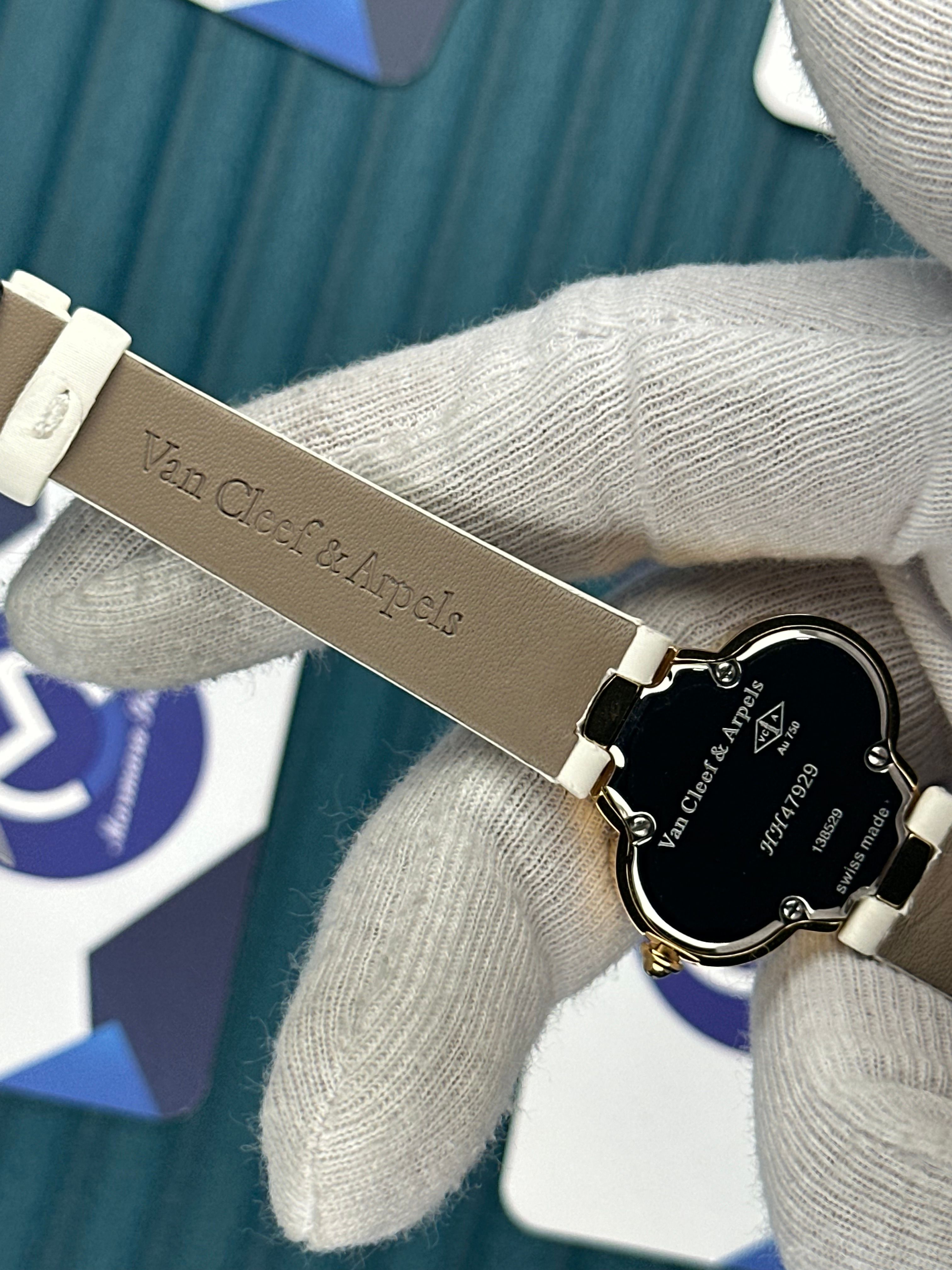 VAN CLEEF & ARPELS WHITE DIAL DIAMOND BEZEL GOLD CASE WHITE LEATHER CORD