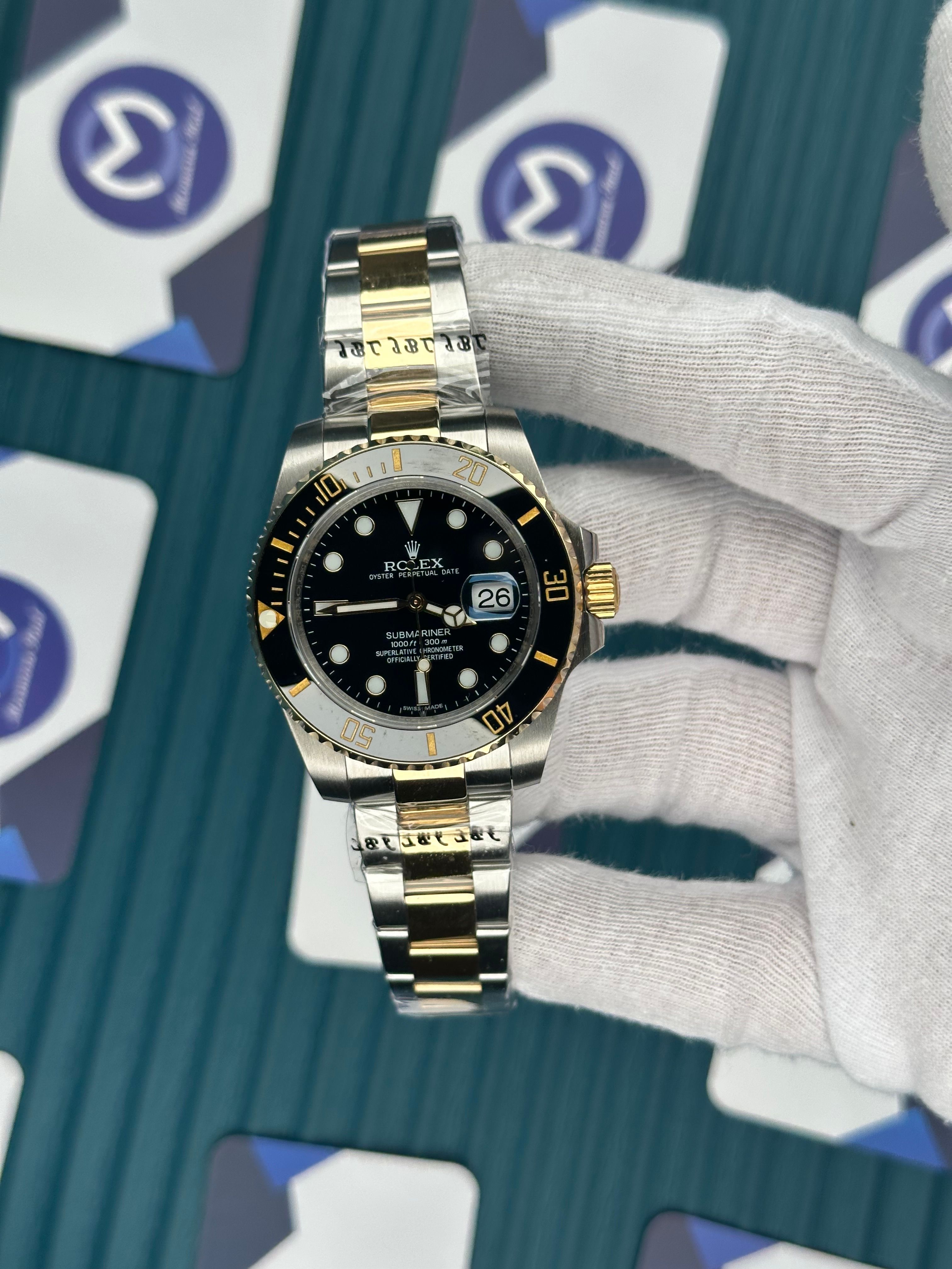 ROLEX SUBMARINER BLACK DIAL GOLD-SILVER OYSTER