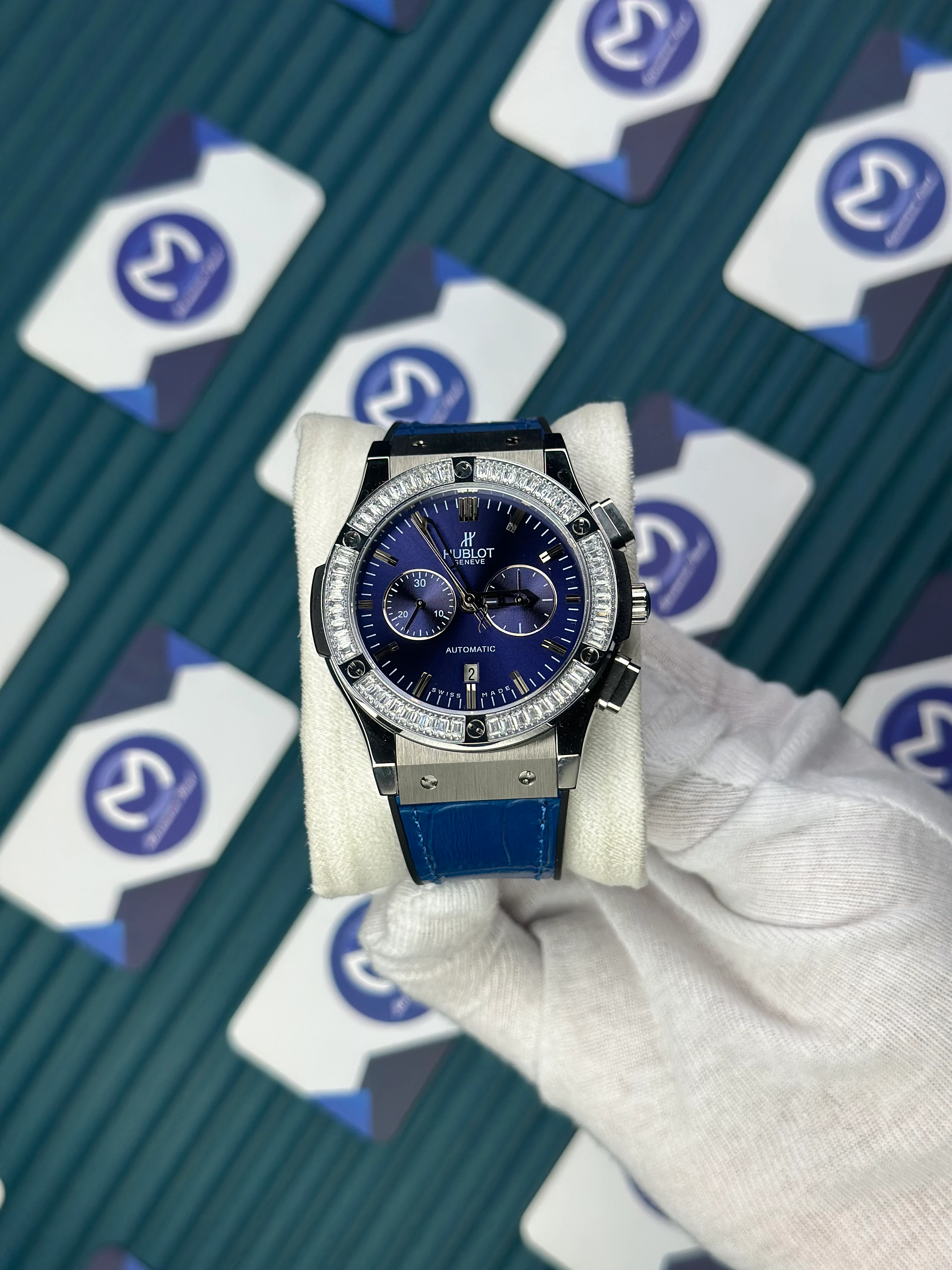 HUBLOT AUTOMATIC BLUE CHRONOGRAPH DIAL DIAMOND BEZEL SILVER CASE BLUE LEATHER CORD 