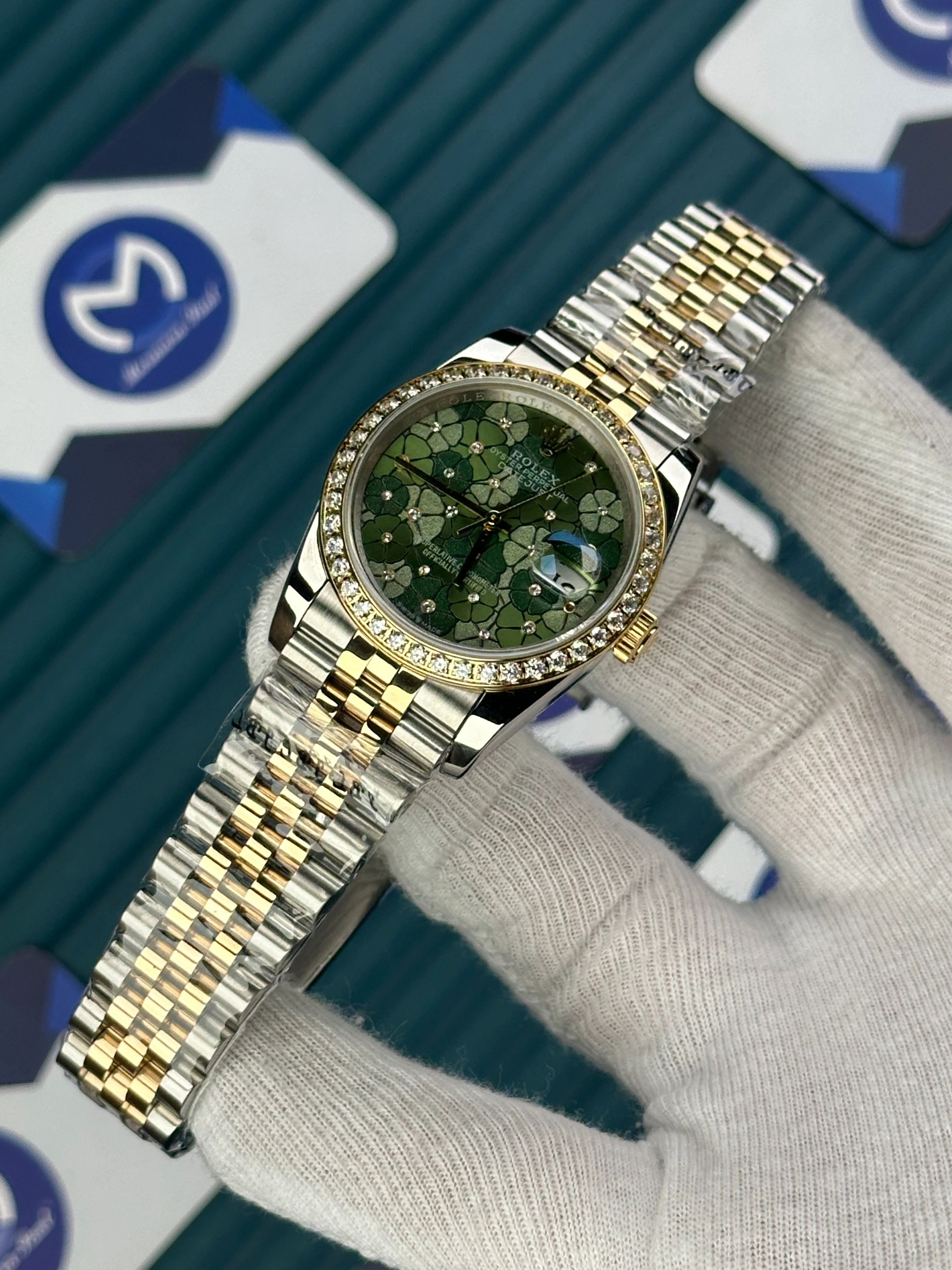 ROLEX 36 MM DATEJUST GREEN LEAF DIAL DIAMOND BEZEL GOLD-SILVER JUBILE 