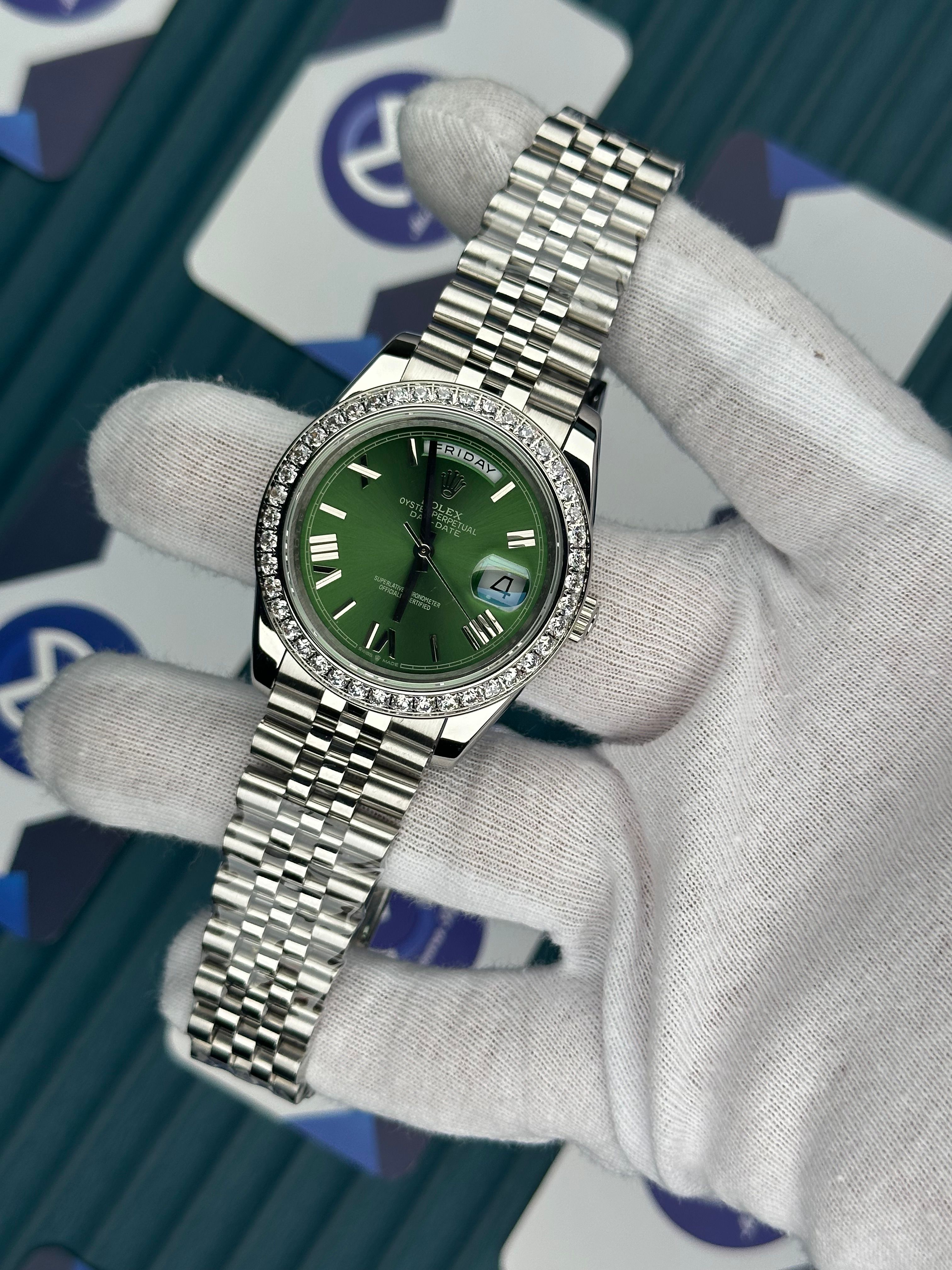 ROLEX DAY-DATE GREEN DIAL DIAMOND BEZEL ROMA INDEX SILVER JUBILE