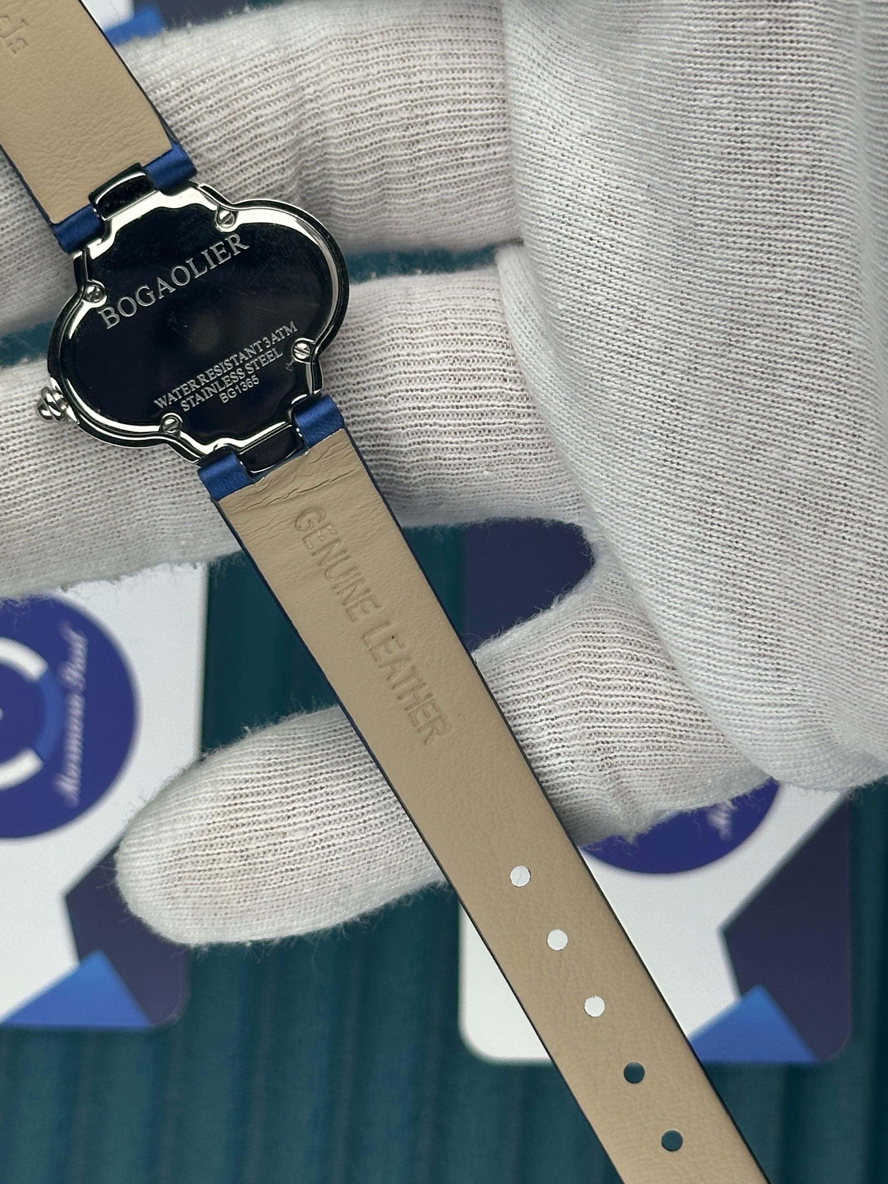 VAN CLEEF & ARPELS WHITE DIAL SILVER CASE BLUE LEATHER CORD