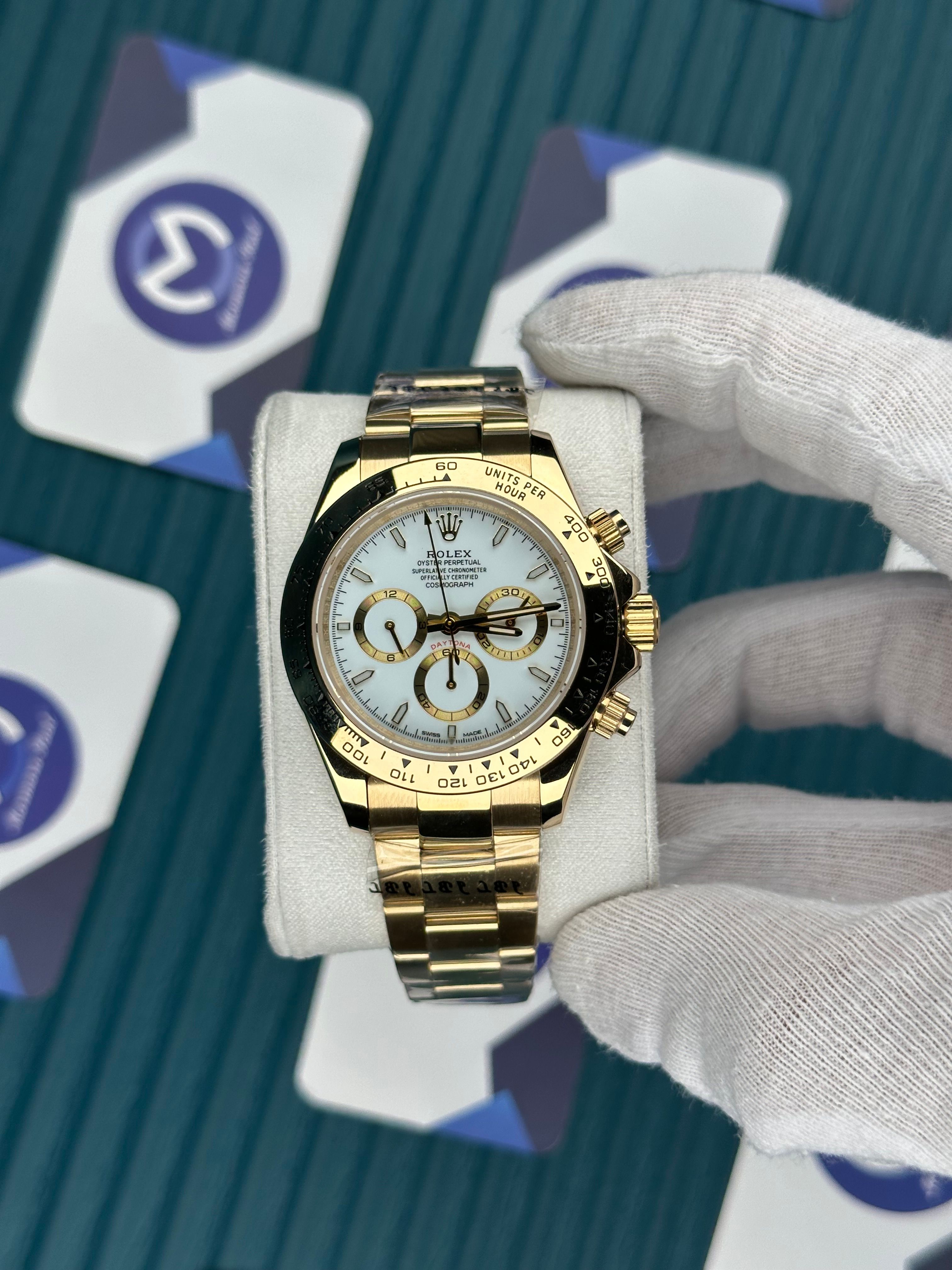 ROLEX DAYTONA WHITE DIAL GOLD OYSTER