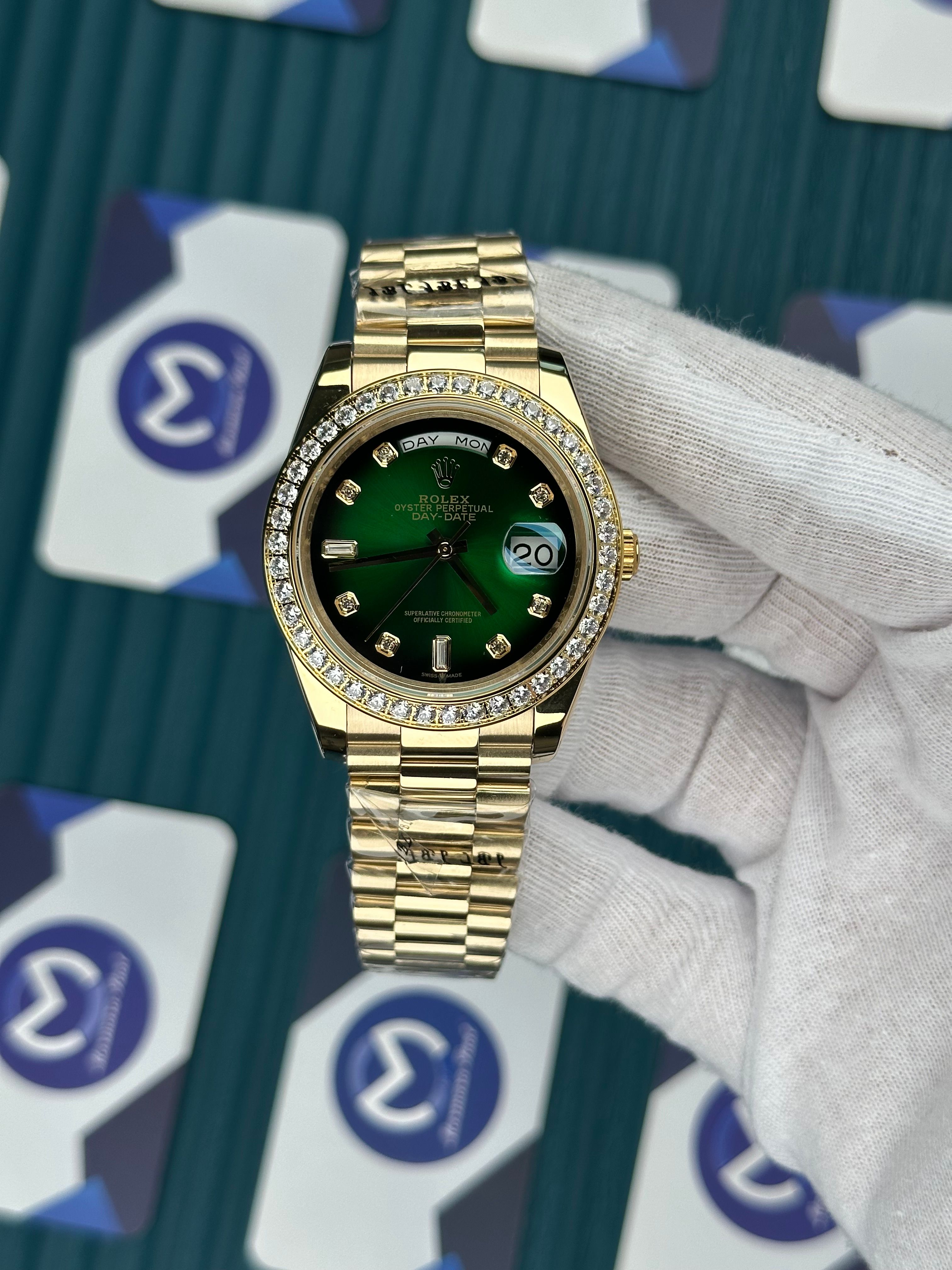 ROLEX DAY-DATE GREEN DIAL DIAMOND INDEX AND BEZEL GOLD PRESIDENT