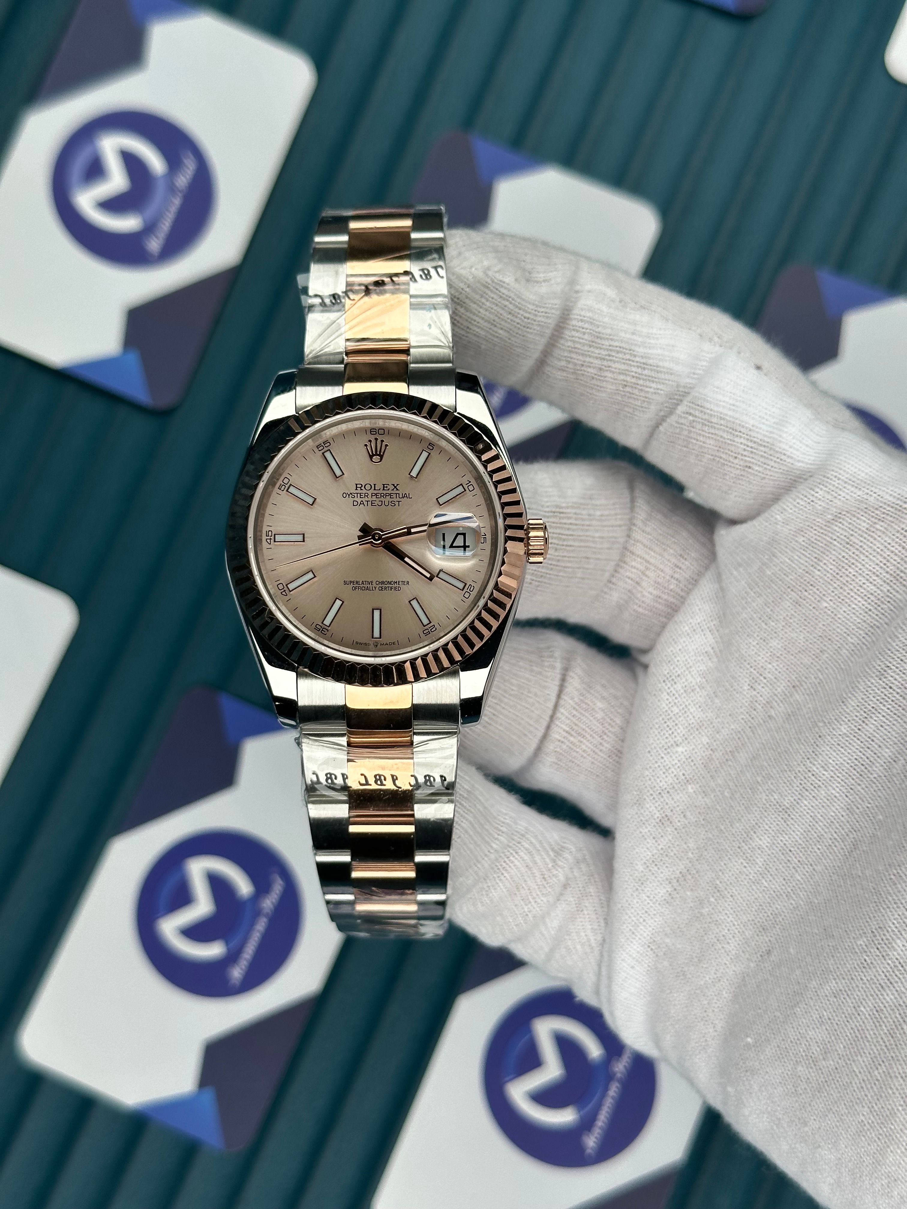 ROLEX DATEJUST OVAL BEZEL CHAMPAGNE DIAL ROSE-SILVER OYSTER