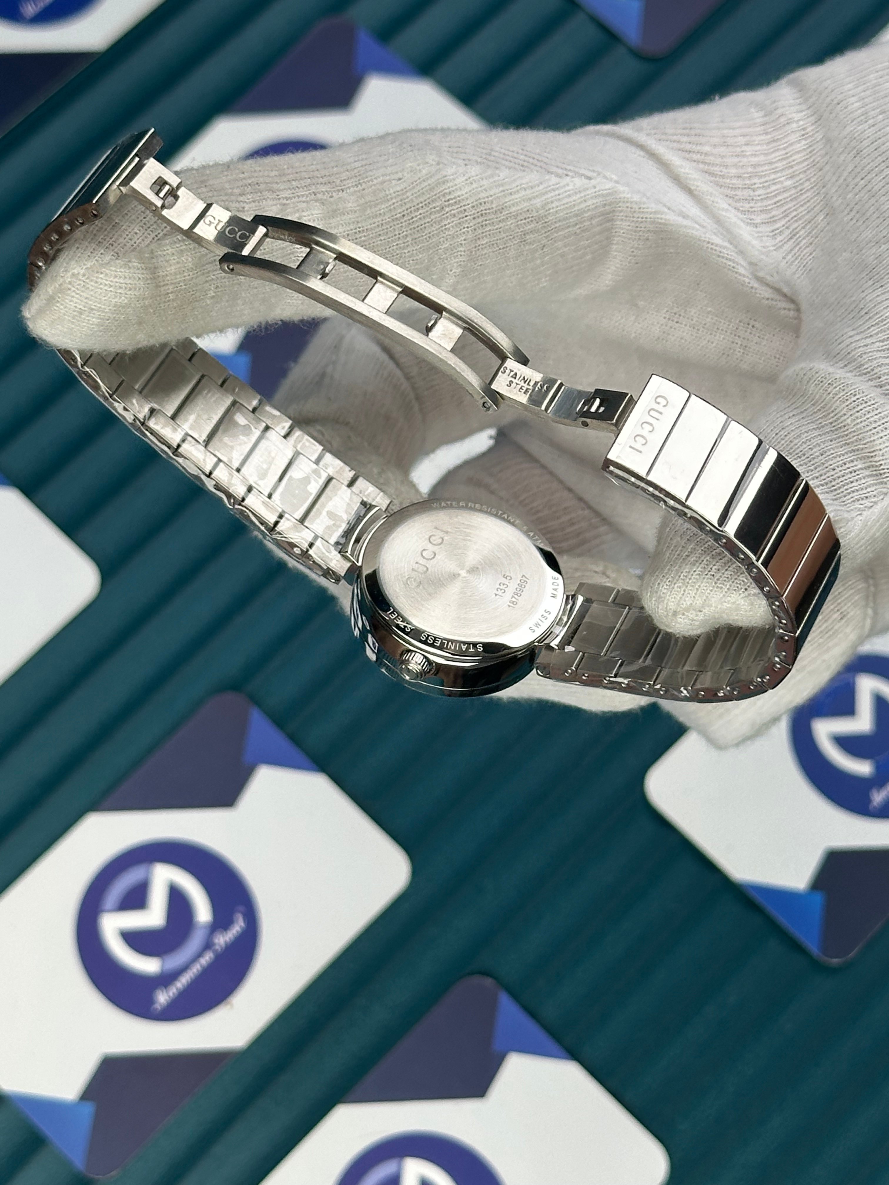 GUCCI WOMAN GREY DIAL G CASE DIAMOND DIAL SILVER CORD