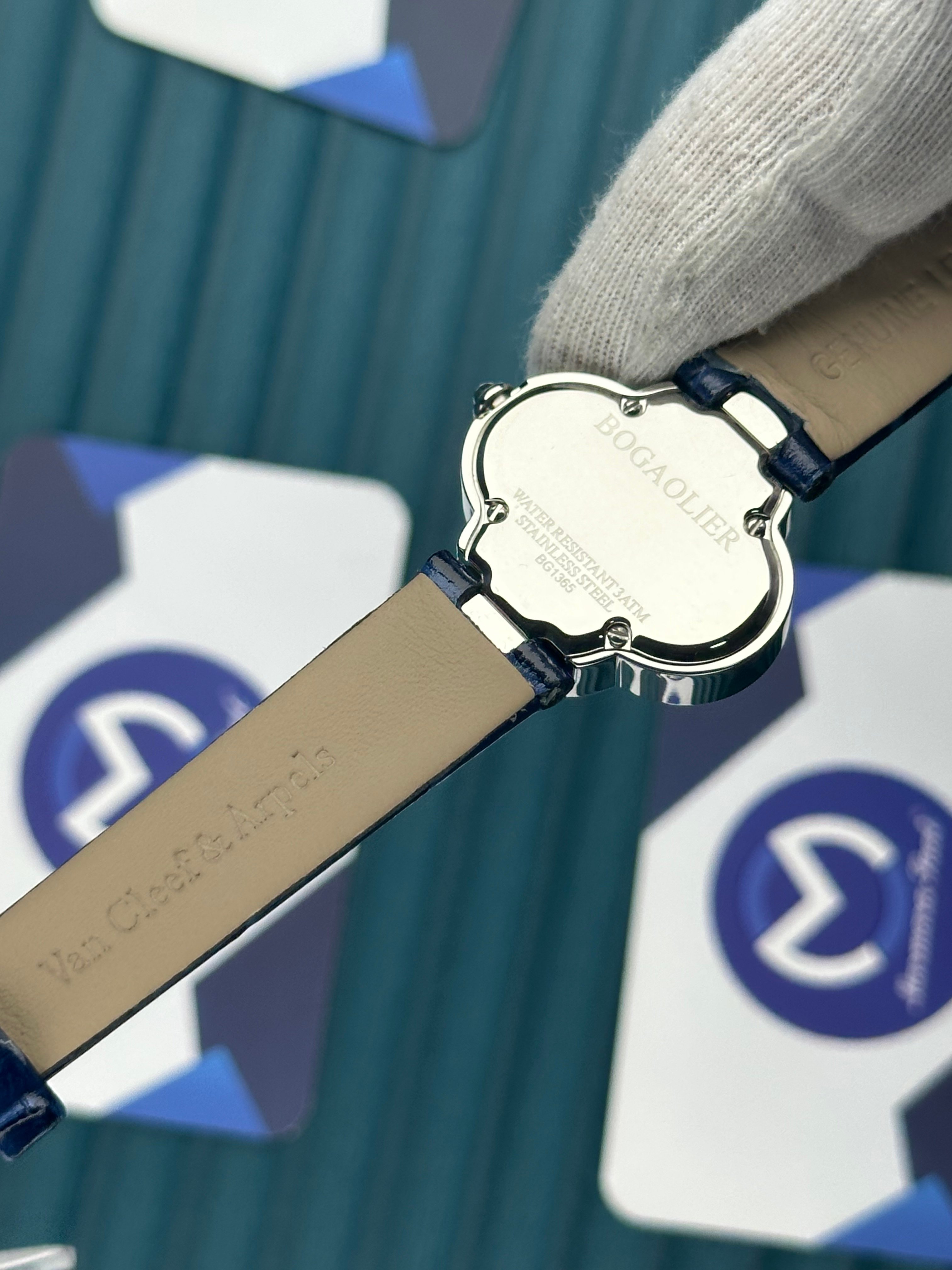 VAN CLEEF & ARPELS WHITE DIAL DIAMOND BEZEL SILVER CASE BLUE LEATHER CORD