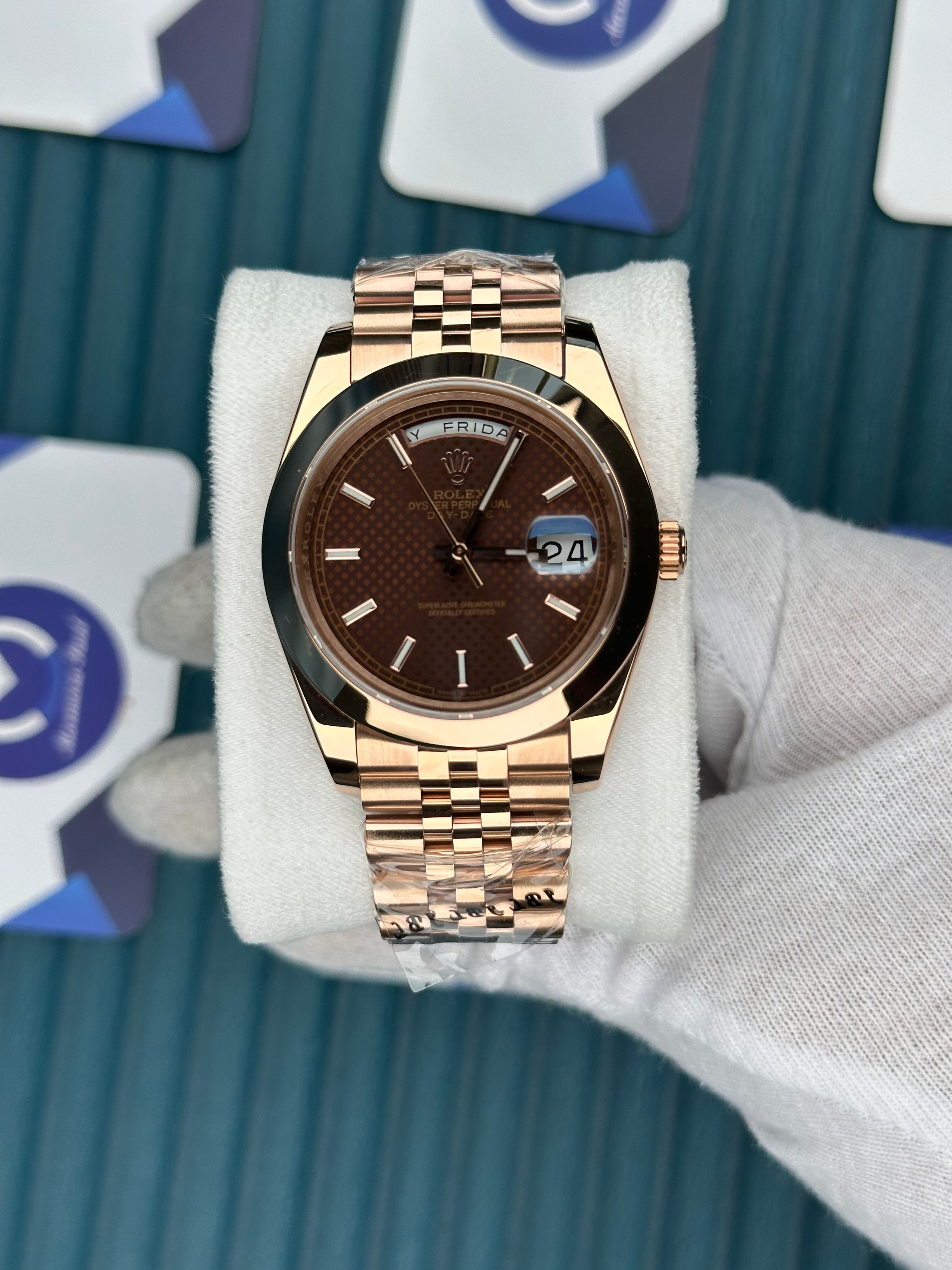 ROLEX DAY-DATE CHOCOLATE MOZAIK DIAL OVAL BEZEL ROSE JUBILE