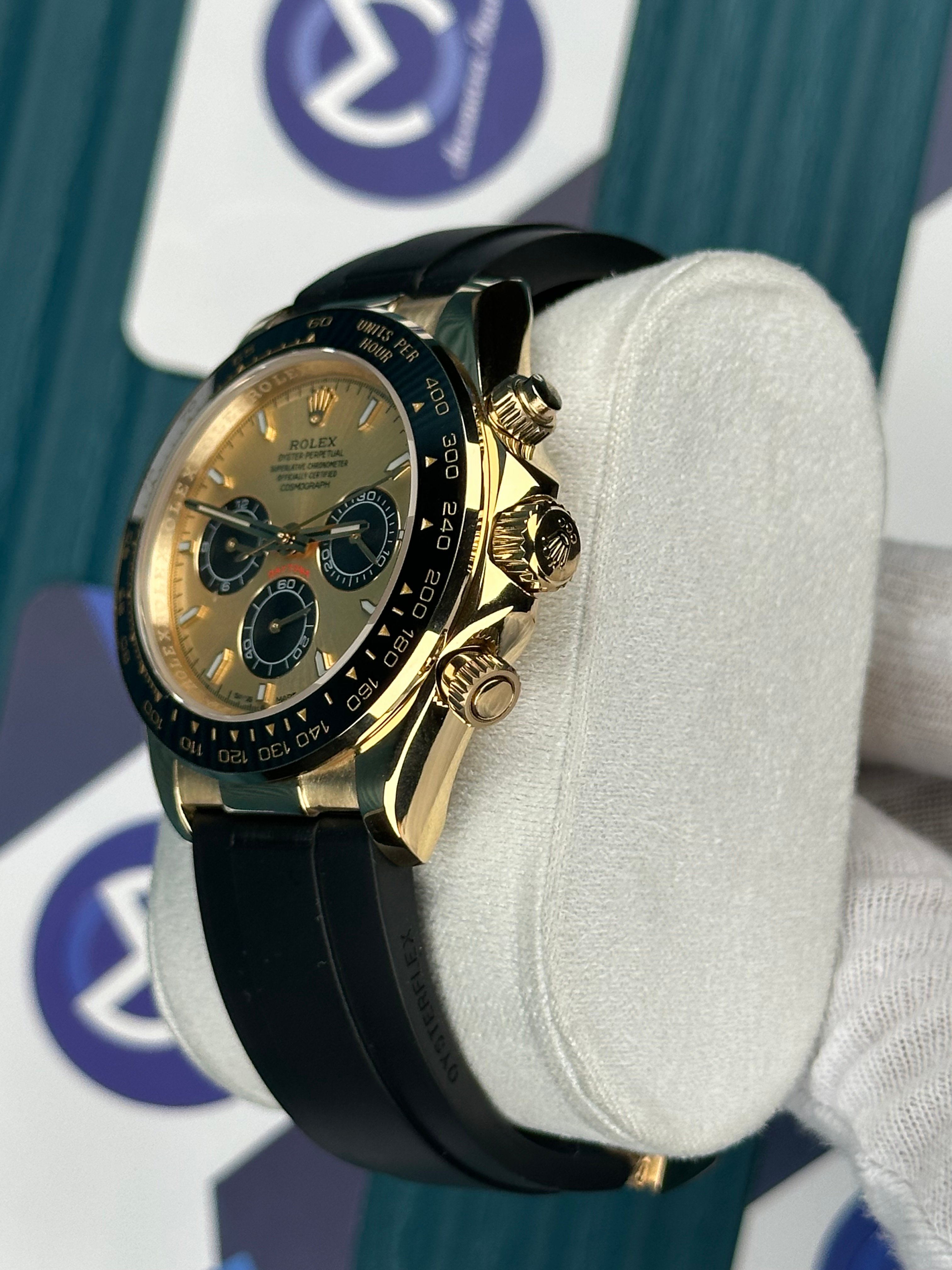 ROLEX DAYTONA CHAMPAGNE DIAL GOLD CASE OYSTERFLEX