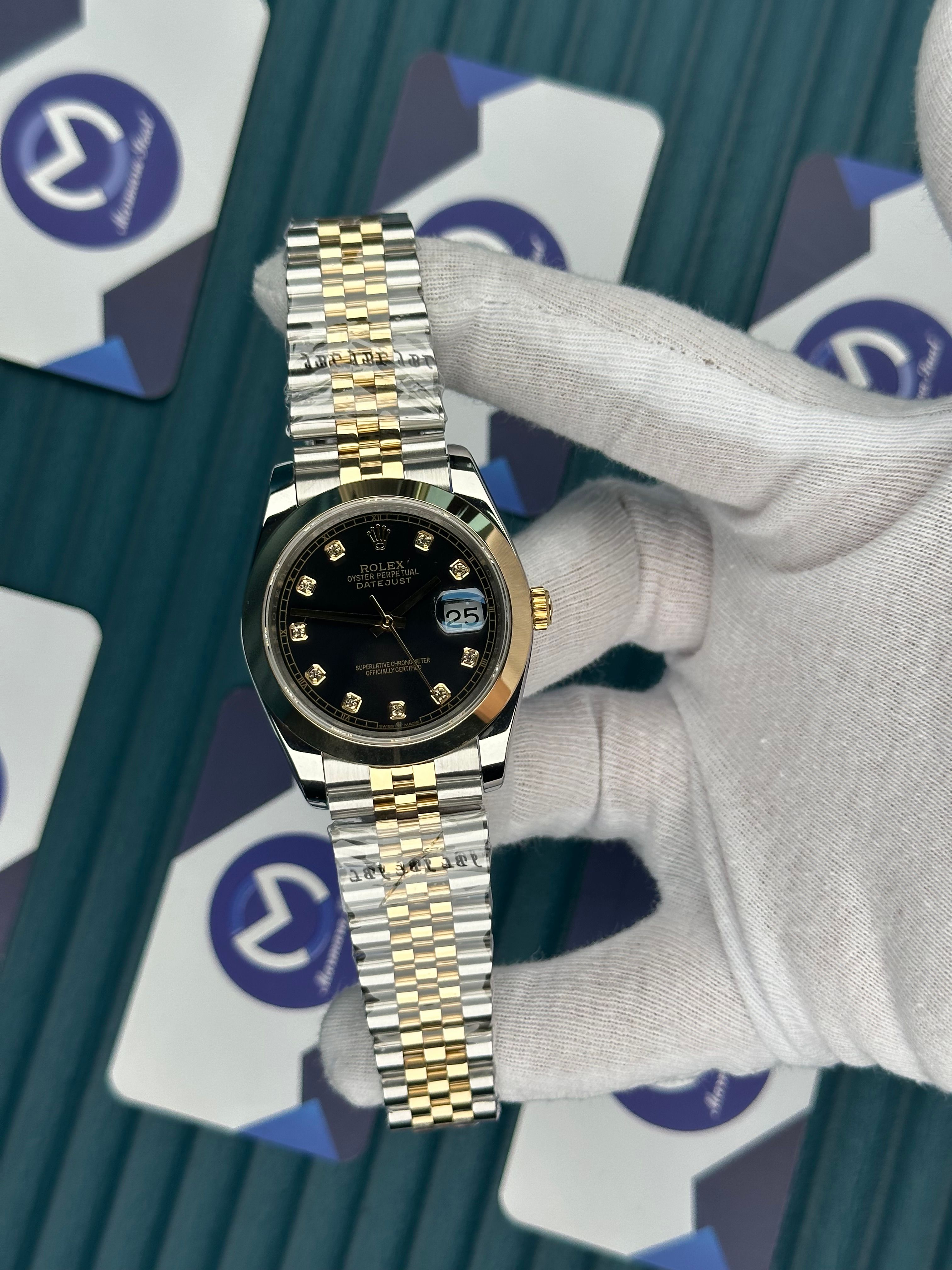 ROLEX DATEJUST OVAL BEZEL BLACK DIAL DIAMOND INDEX GOLD-JUBILE