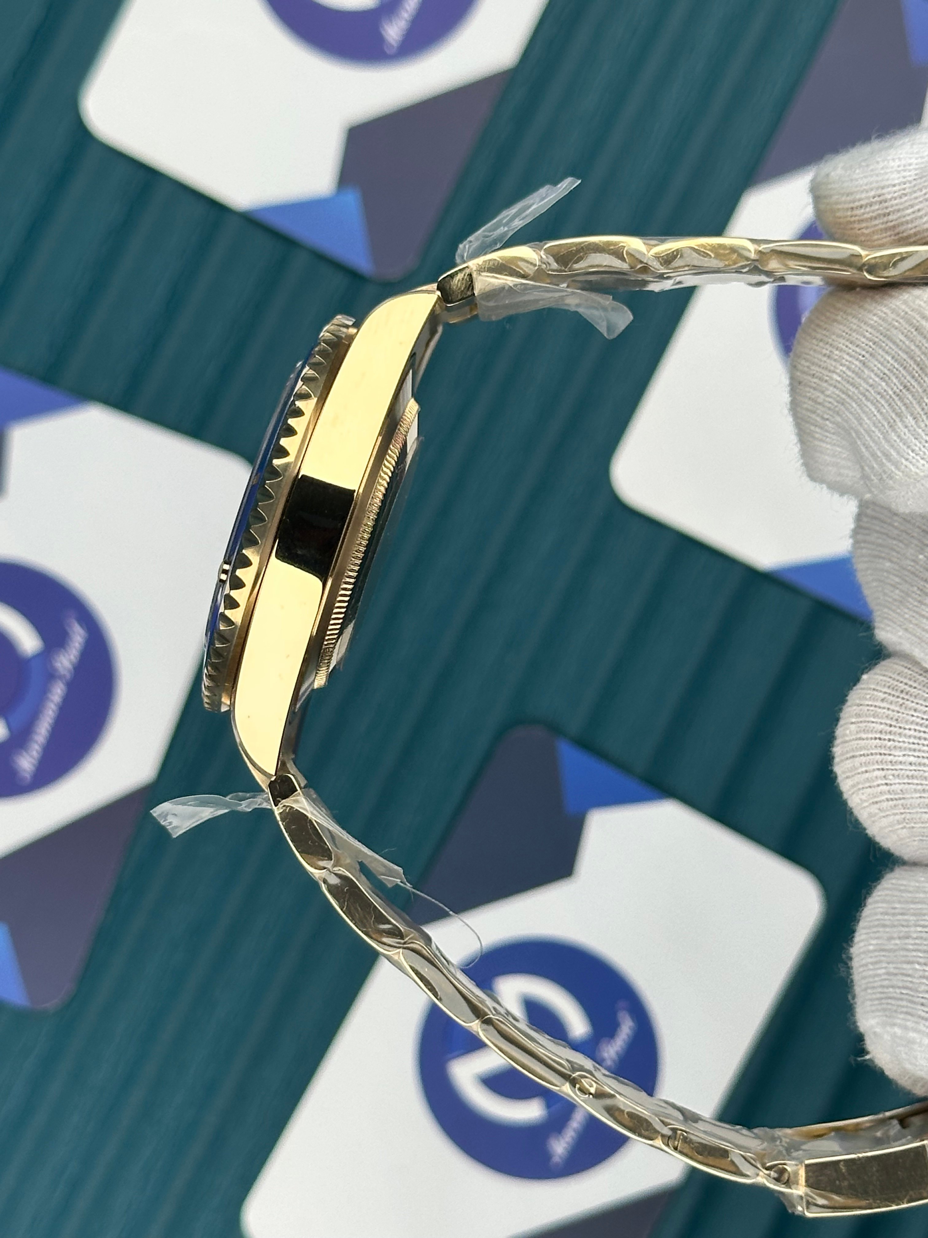 ROLEX SUBMARINER BLUE DIAL GOLD OYSTER