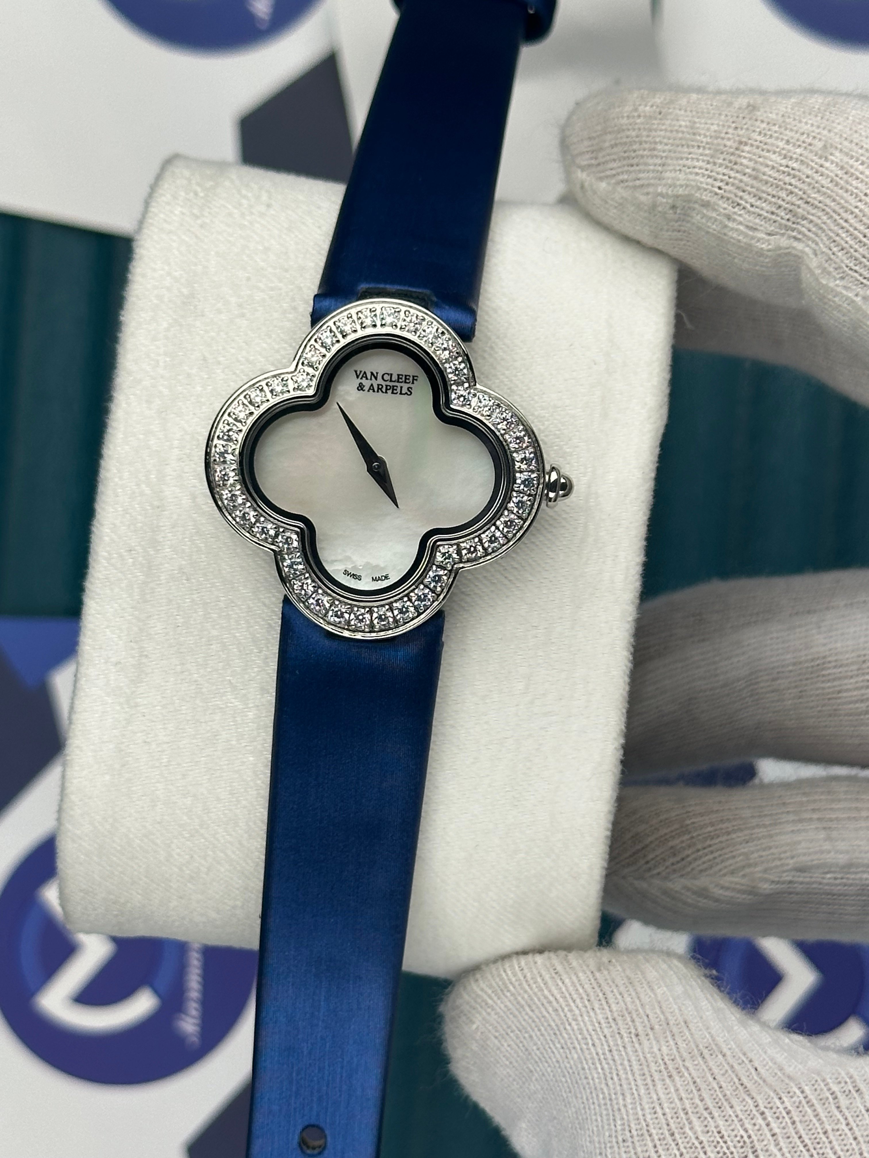VAN CLEEF & ARPELS WHITE DIAL SILVER CASE BLUE LEATHER CORD