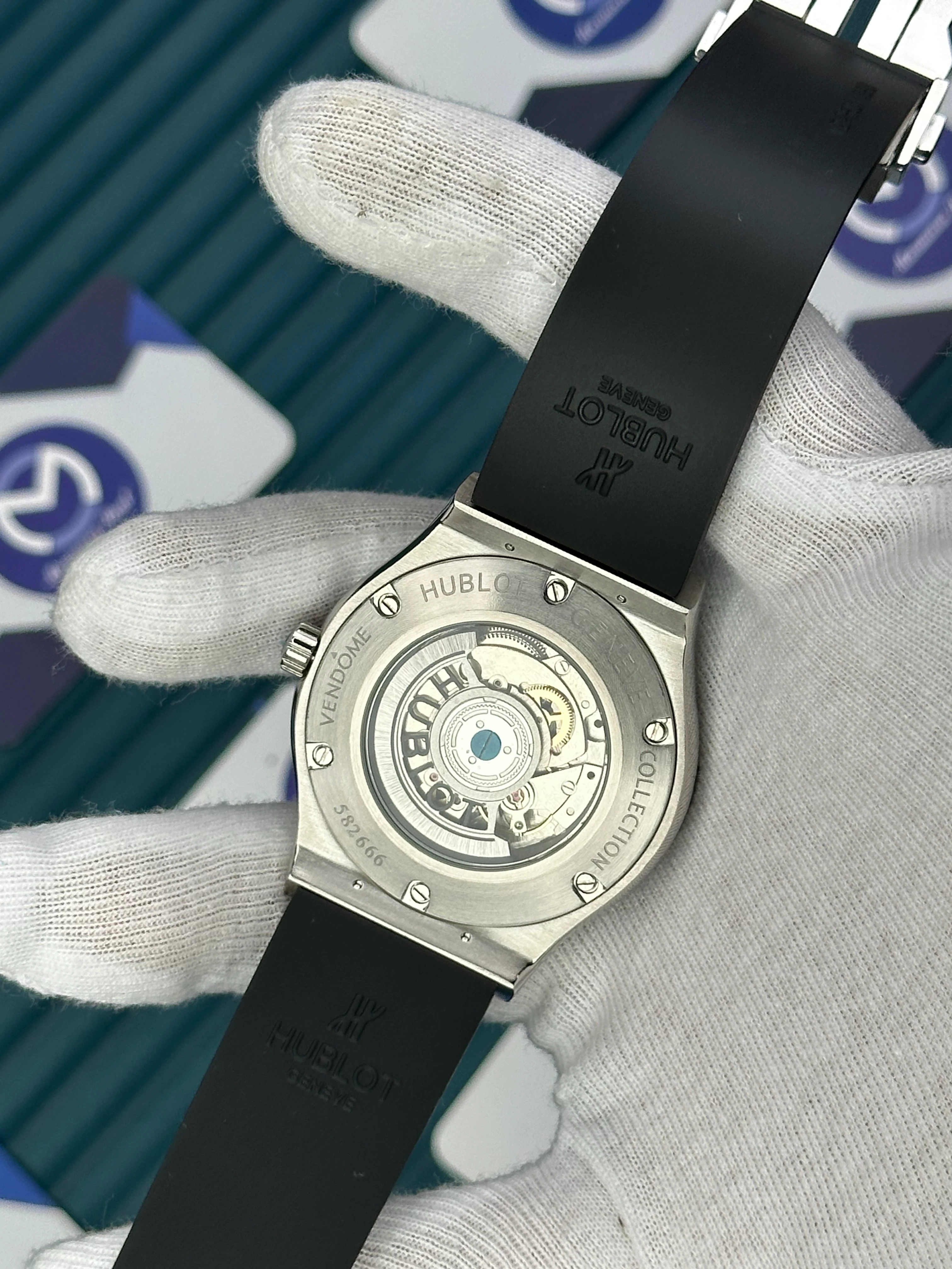 HUBLOT GENEVE AUTOMATIC VENDOME BLACK DIAL NO INDEX SILVER CASE BLACK RUBBER CORD 