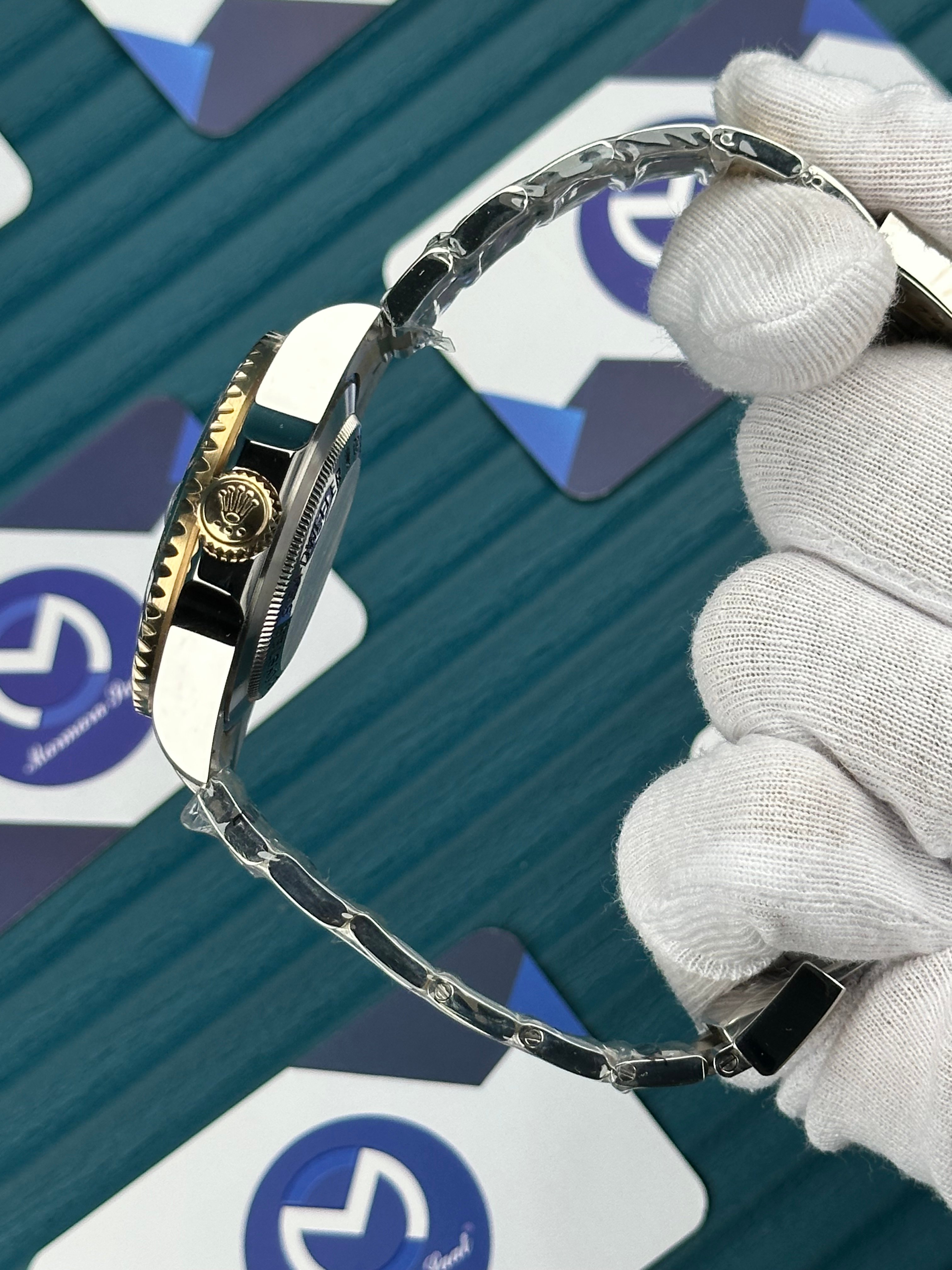 ROLEX SEA DWELLER BLACK DIAL GOLD-SILVER OYSTER