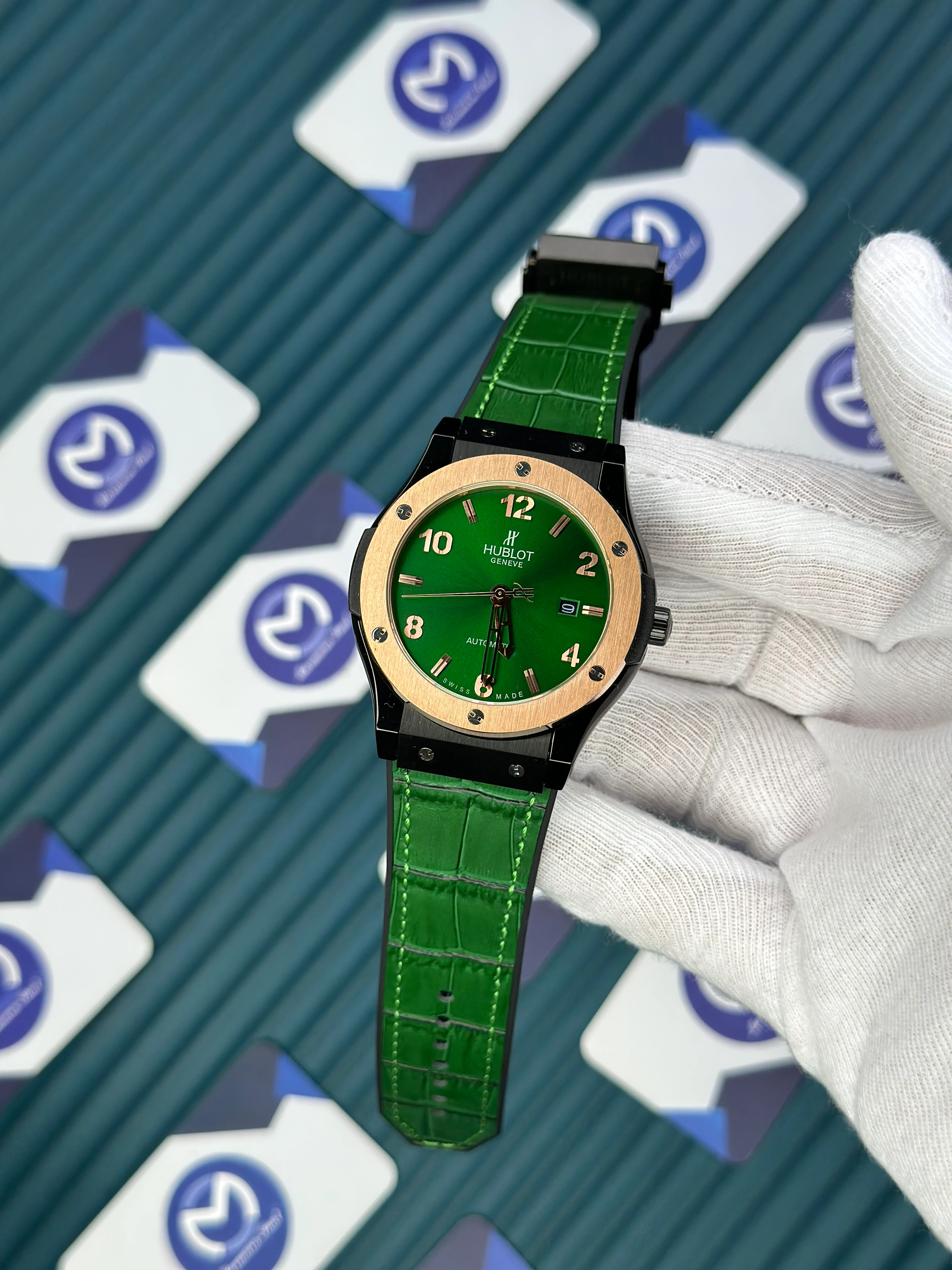 HUBLOT GENEVE AUTOMATIC GREEN DIAL ROSE BEZEL BLACK CASE GREEN LEATHER CORD
