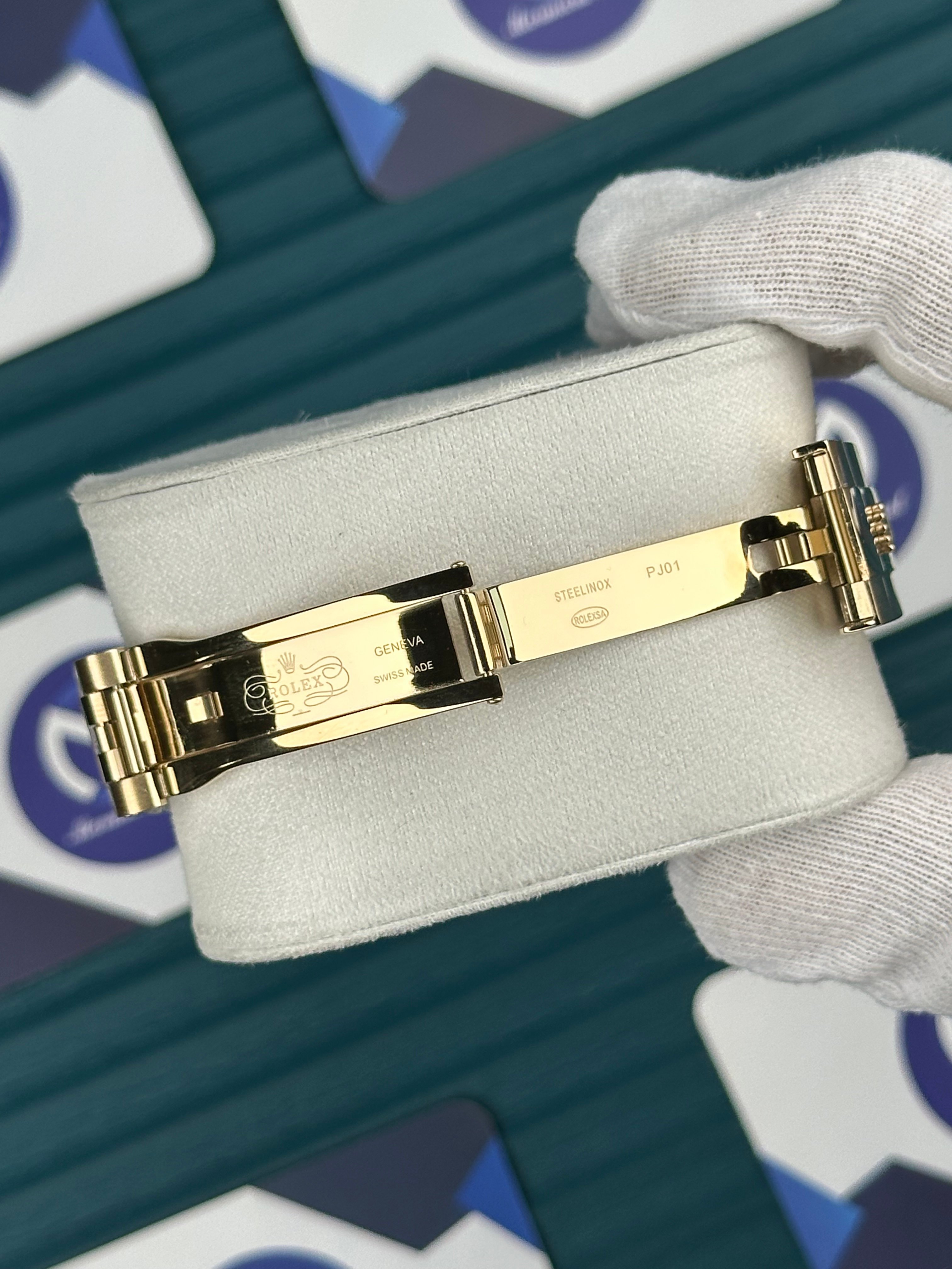 ROLEX DAY-DATE BLACK DIAL GOLD ROMA INDEX GOLD JUBILE