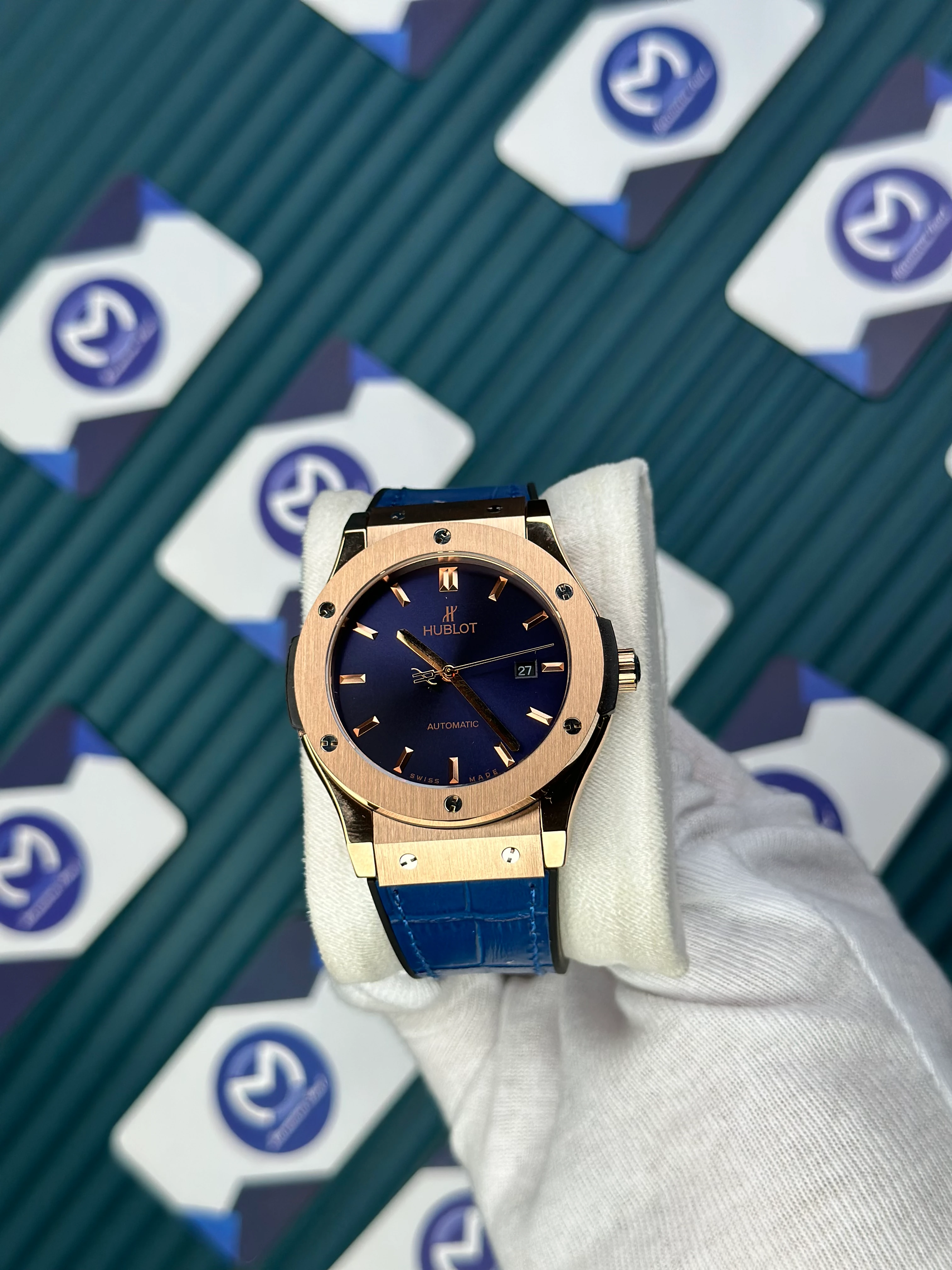 HUBLOT GENEVE AUTOMATIC VENDOME BLUE DIAL AND LEATHER CORD ROSE CASE