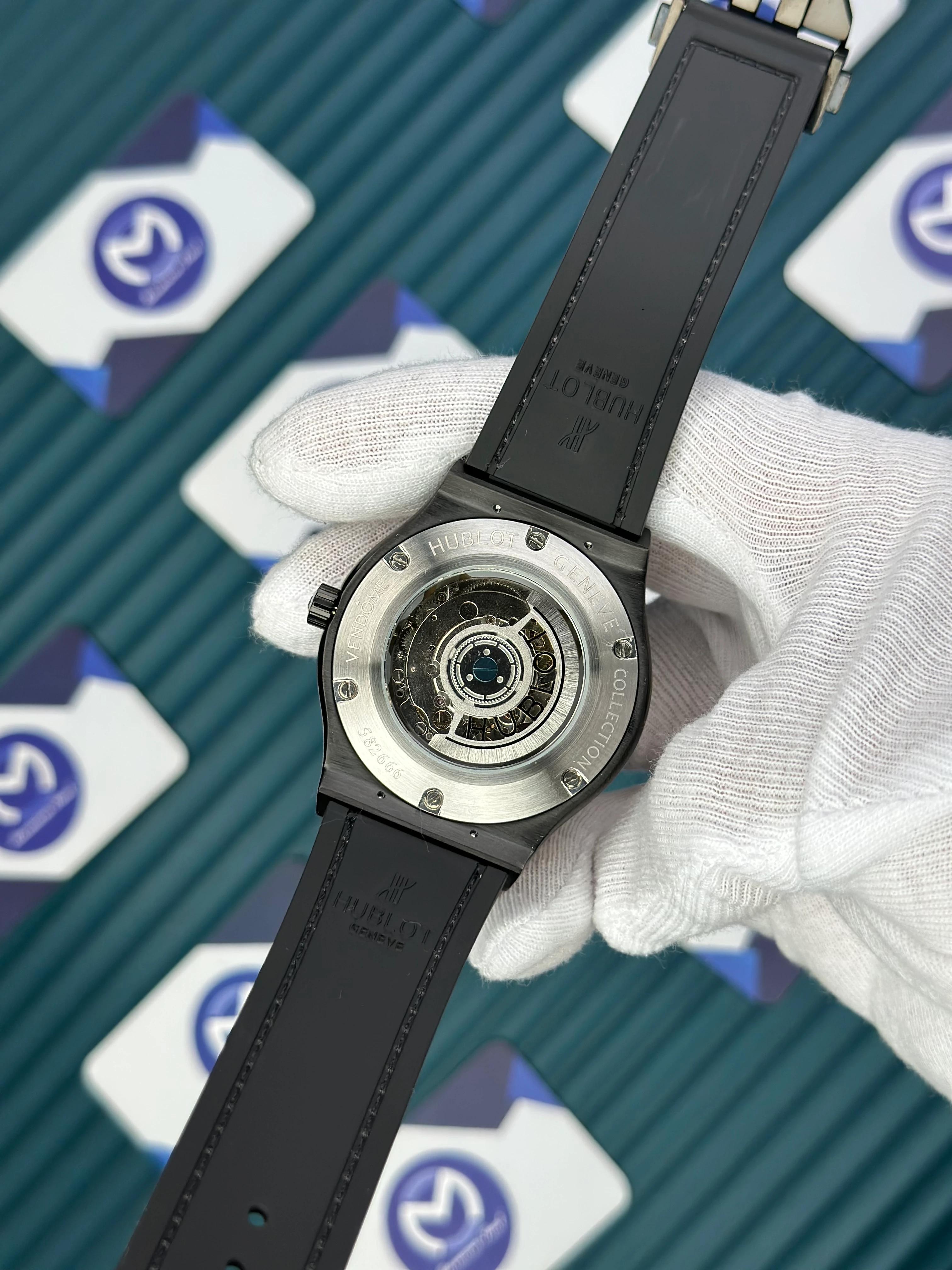 HUBLOT GENEVE AUTOMATIC VENDOME BLACK DIAL ROSE BEZEL BLACK CASE BLACK LEATHER CORD