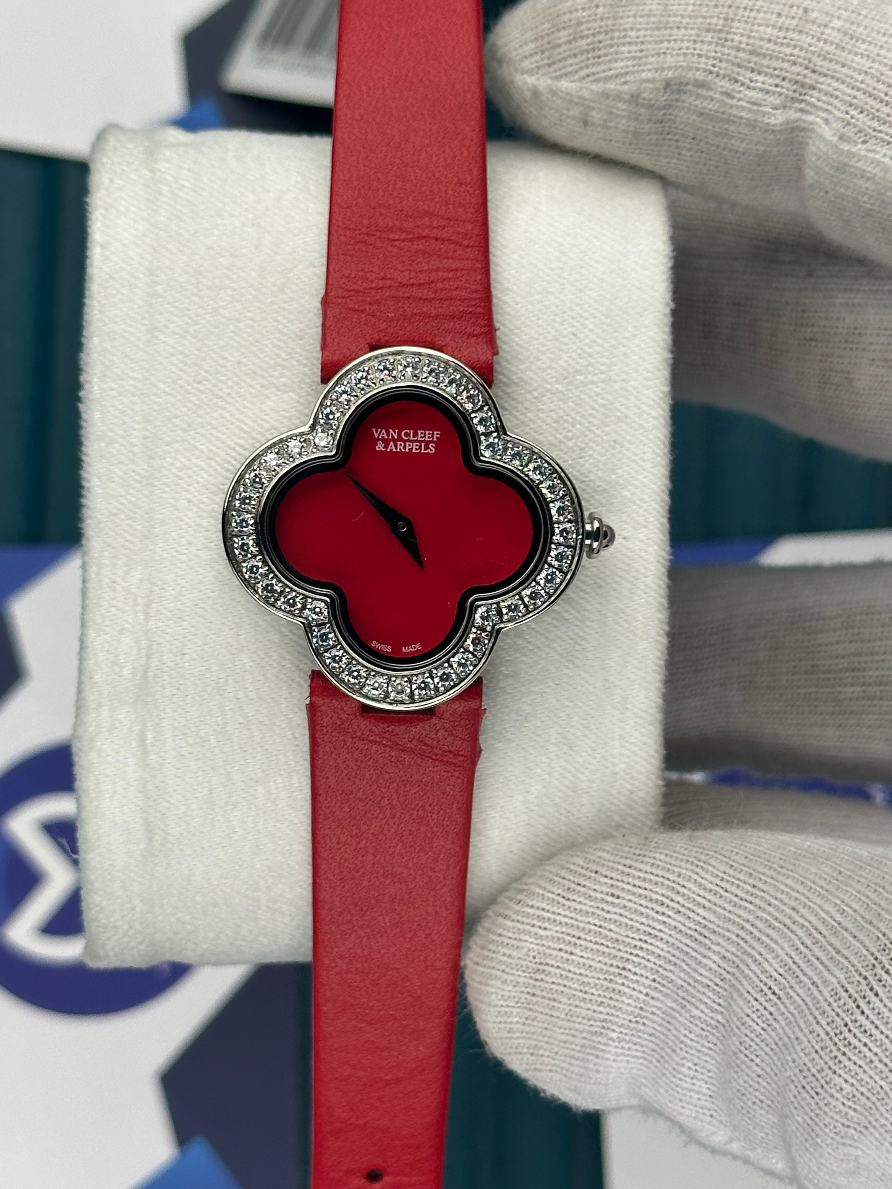 VAN CLEEF & ARPELS RED DIAL DIAMOND BEZEL SILVER CASE RED LEATHER CORD