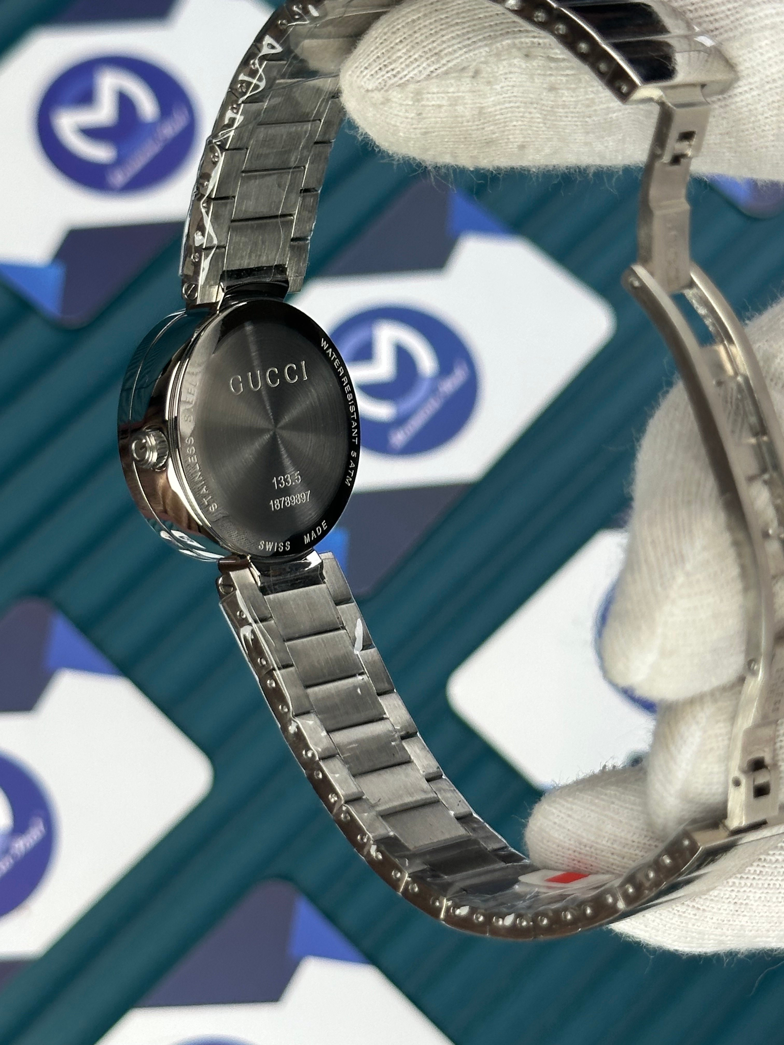 GUCCI WOMAN GREY DIAL G CASE DIAMOND DIAL SILVER CORD
