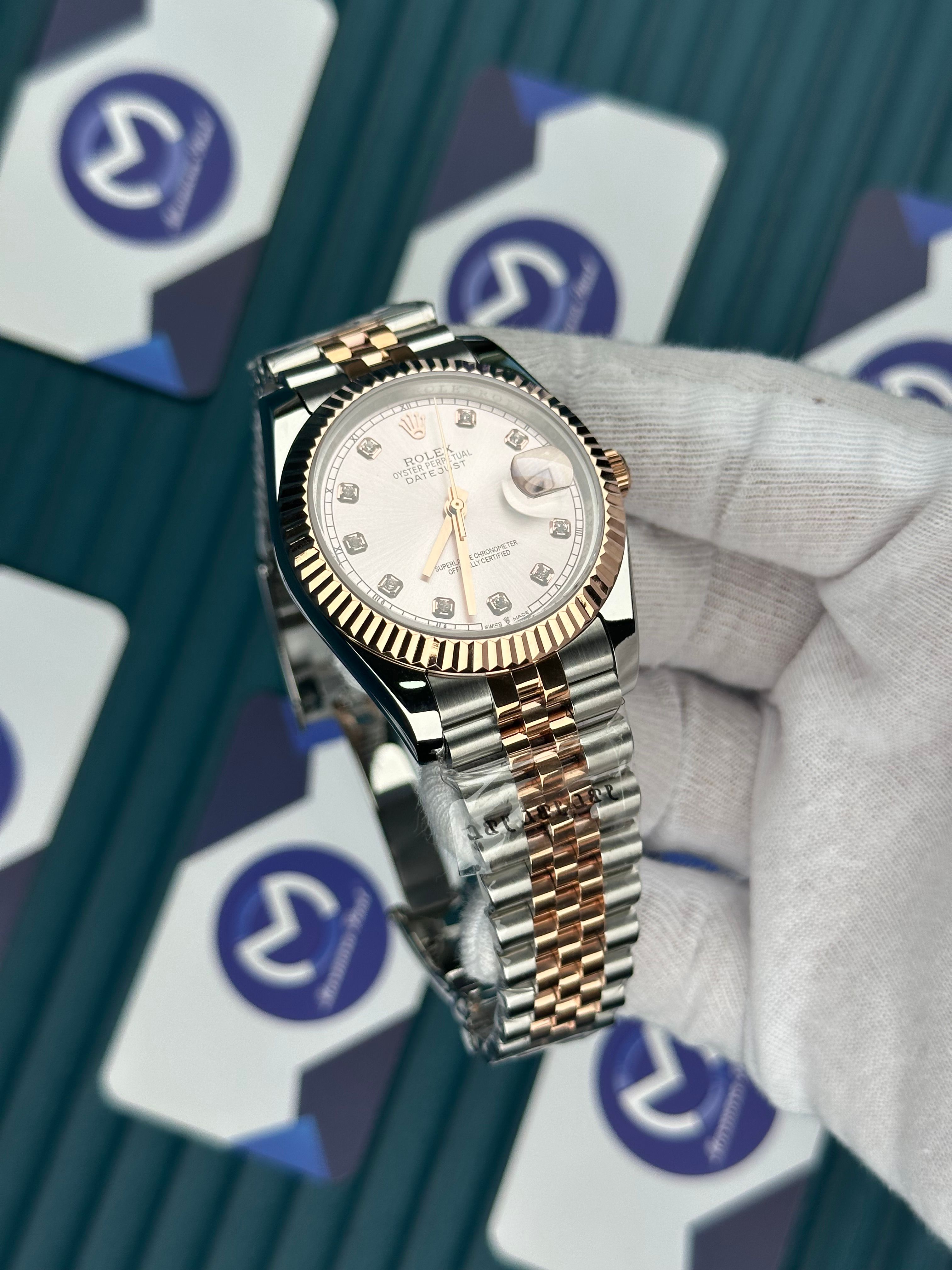 ROLEX DATEJUST CHAMPAGNE DIAL DIAMOND INDEX ROSE-SILVER JUBILE