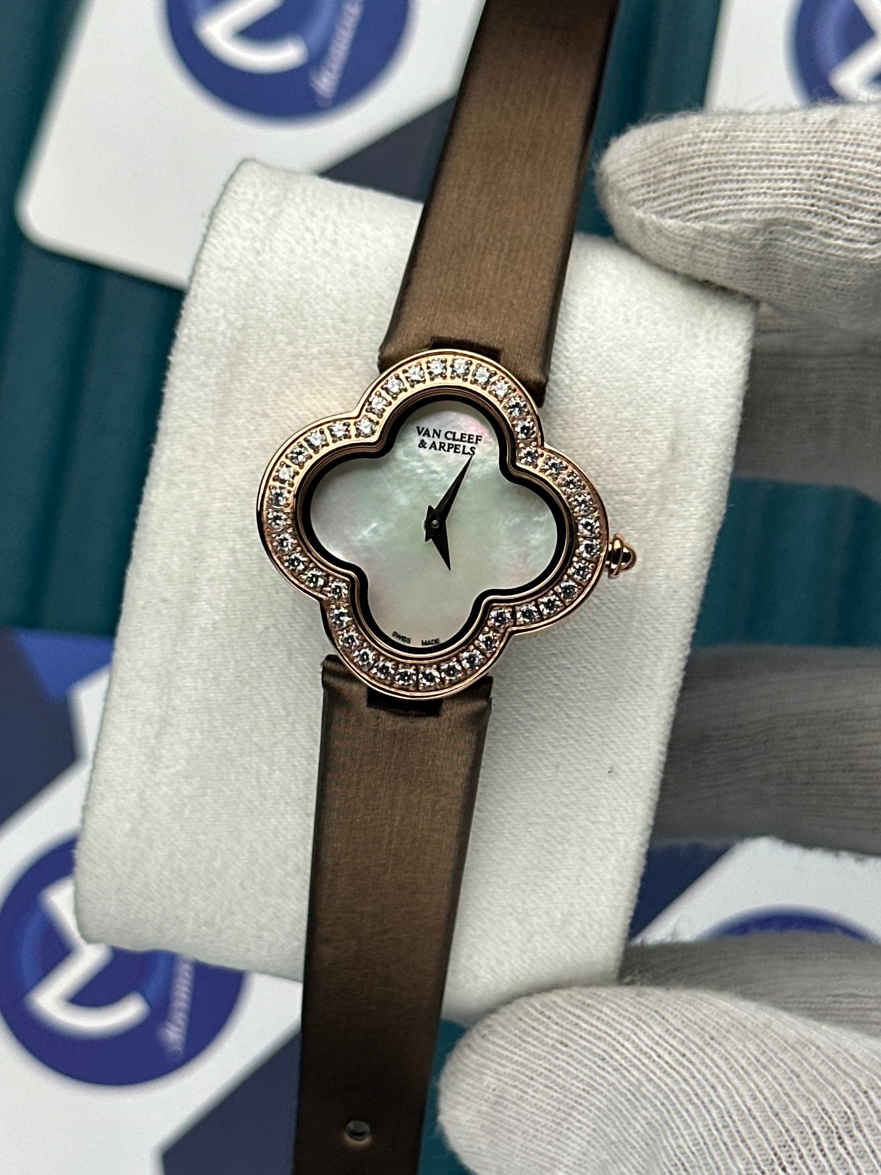 VAN CLEEF & ARPELS WHITE DIAL DIAMOND BEZEL ROSE CASE BROWN LEATHER CORD