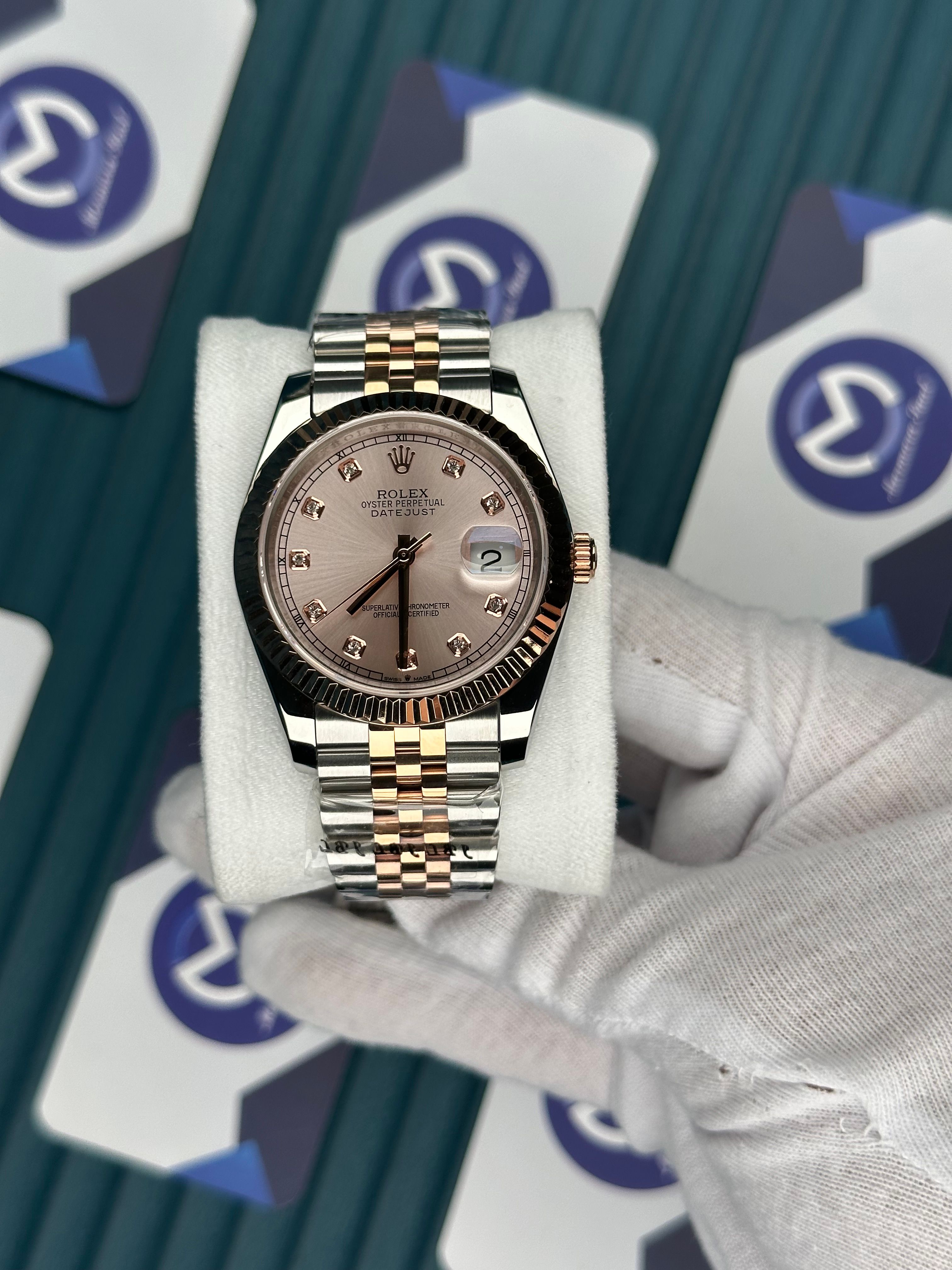 ROLEX DATEJUST CHAMPAGNE DIAL DIAMOND INDEX ROSE-SILVER JUBILE