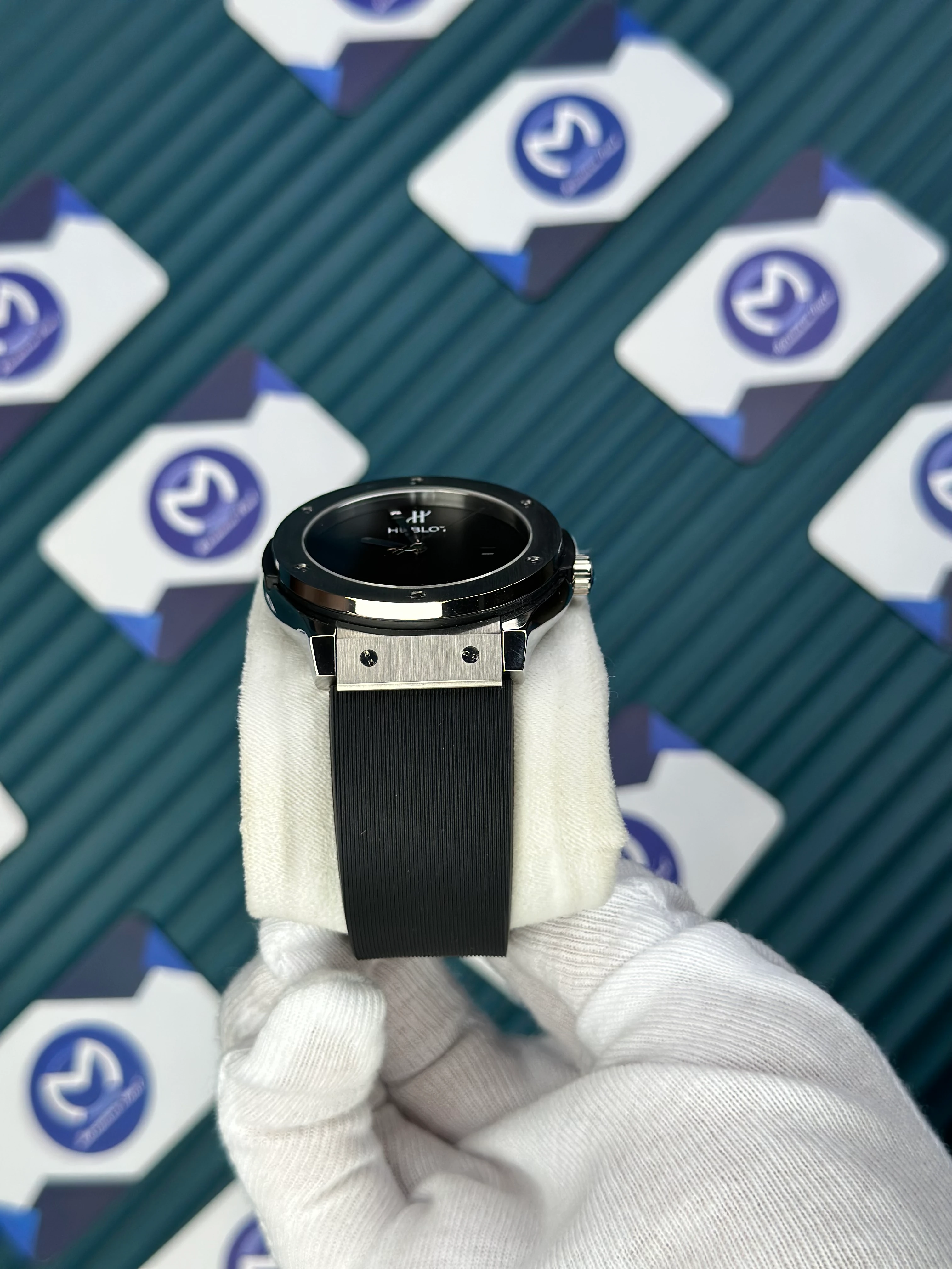 HUBLOT GENEVE AUTOMATIC VENDOME BLACK DIAL NO INDEX SILVER CASE BLACK RUBBER CORD 