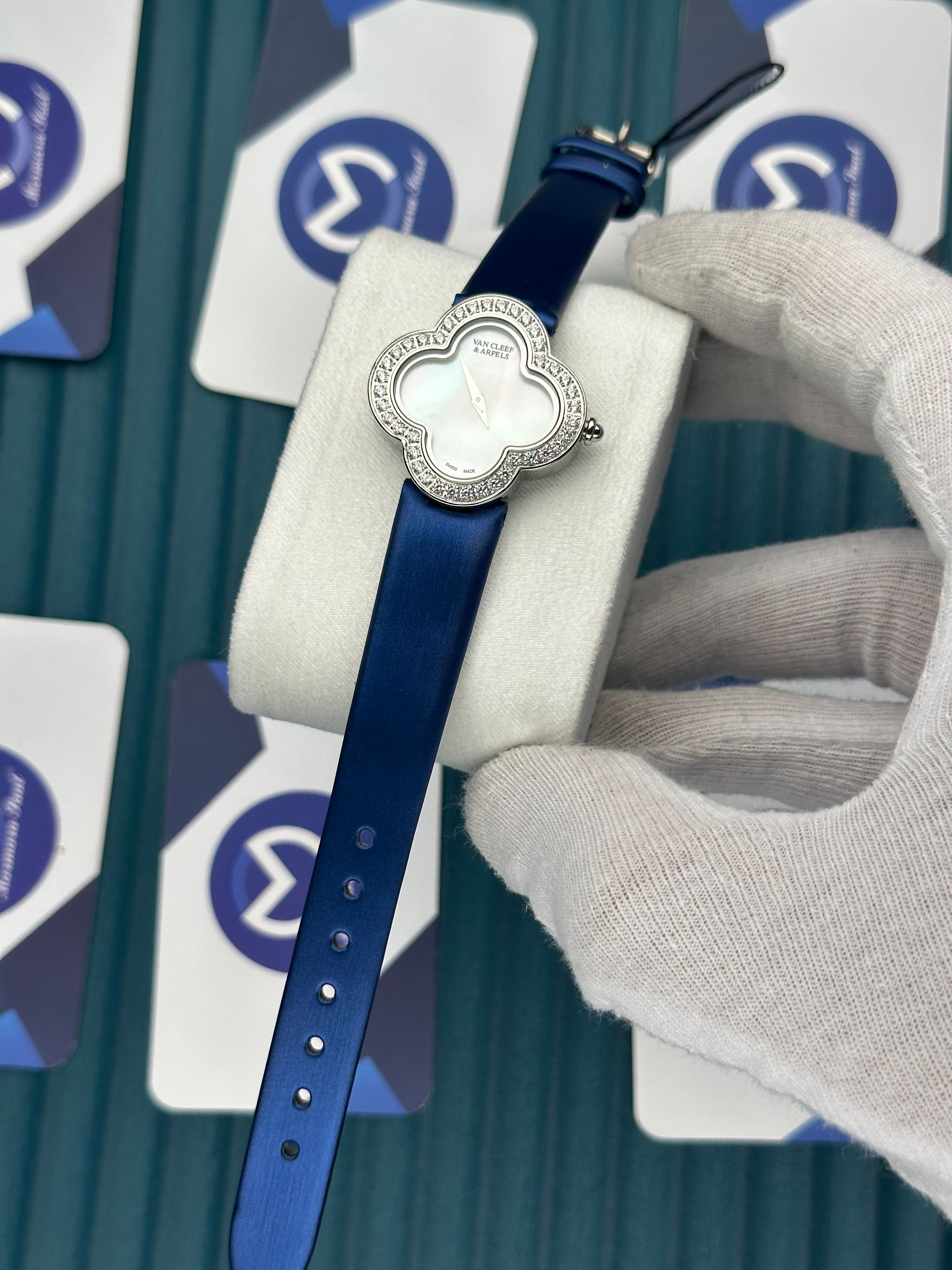 VAN CLEEF & ARPELS WHITE DIAL SILVER CASE BLUE LEATHER CORD